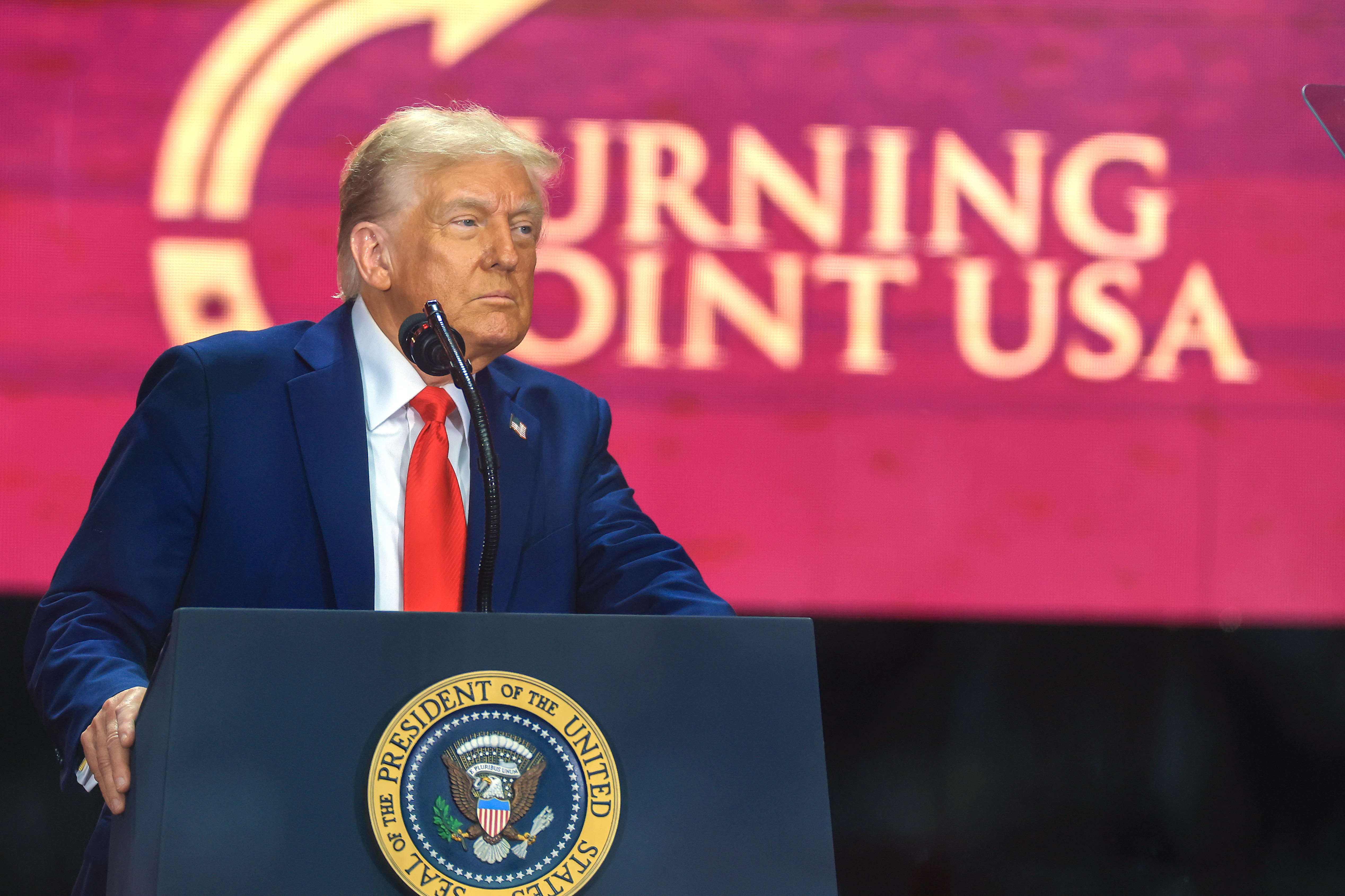 President Donald Trump speaks during the public memorial service for Charlie Kirk at State Farm Stadium on September 21, 2025 | Source: Getty Images