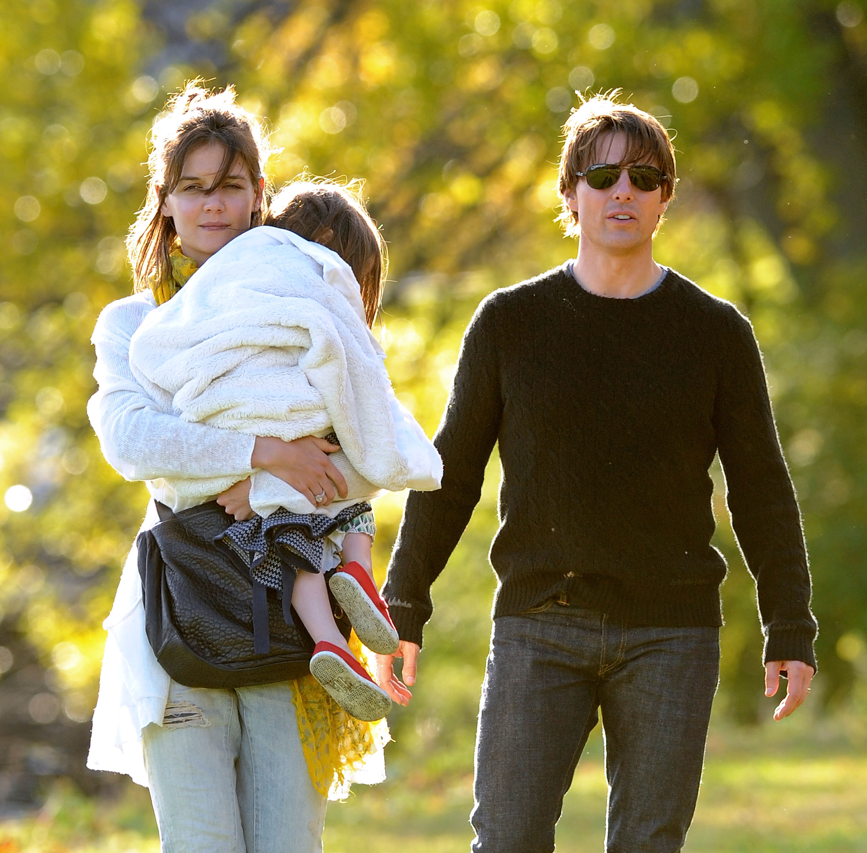 Tom Cruise and Katie Holmes, with their daughter Suri in Massachusetts in 2009 | Source: Getty Images