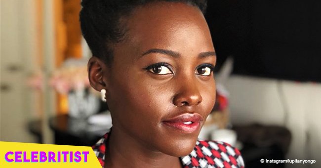 Lupita Nyong'o turns heads with jewels on her eyes and plunging yellow dress