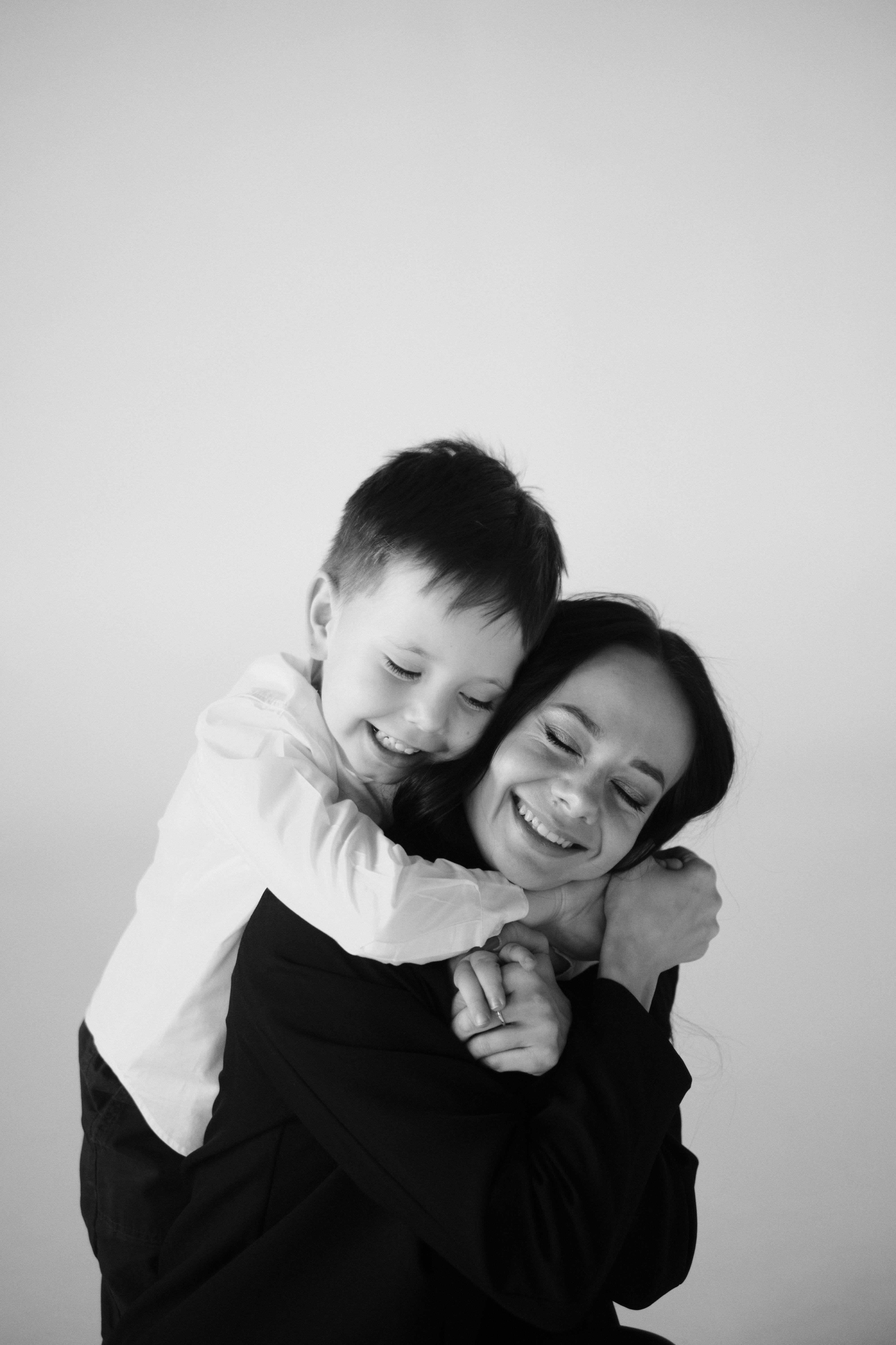 A woman hugging her son | Source: Pexels