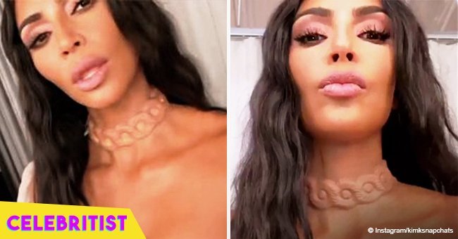 Kim Kardashian stops hearts flaunting 'alien' necklace that looks implanted under her skin