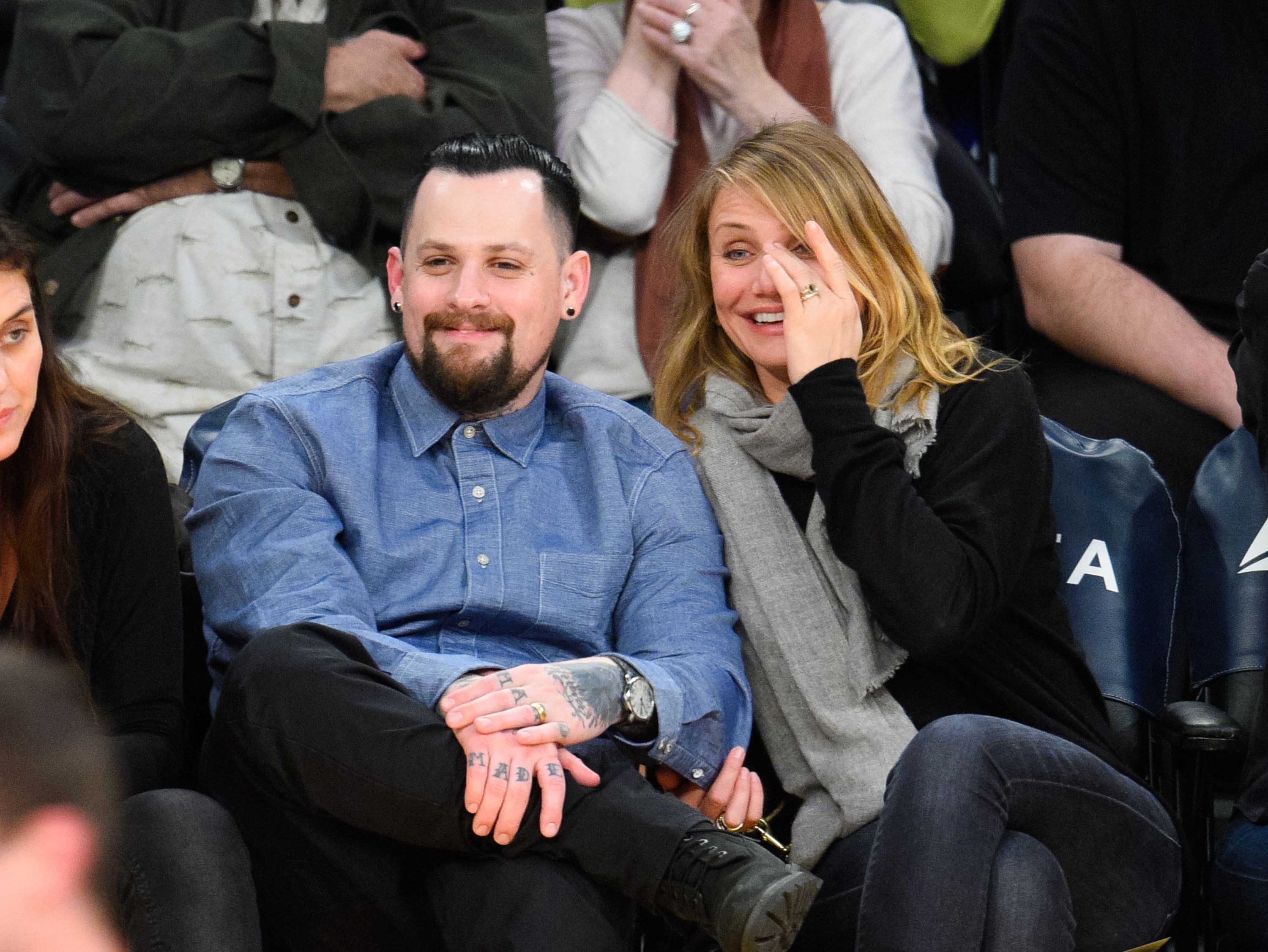 Benji Madden and Cameron Diaz at a basketball game held at Staples Center on January 27, 2015, in Los Angeles, California | Source: Getty Images