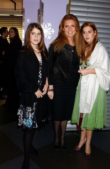 Princess Eugenie, Sarah Ferguson and Princess Beatrice at Harvey Nichols on December 19, 2004 in London | Photo: Getty Images