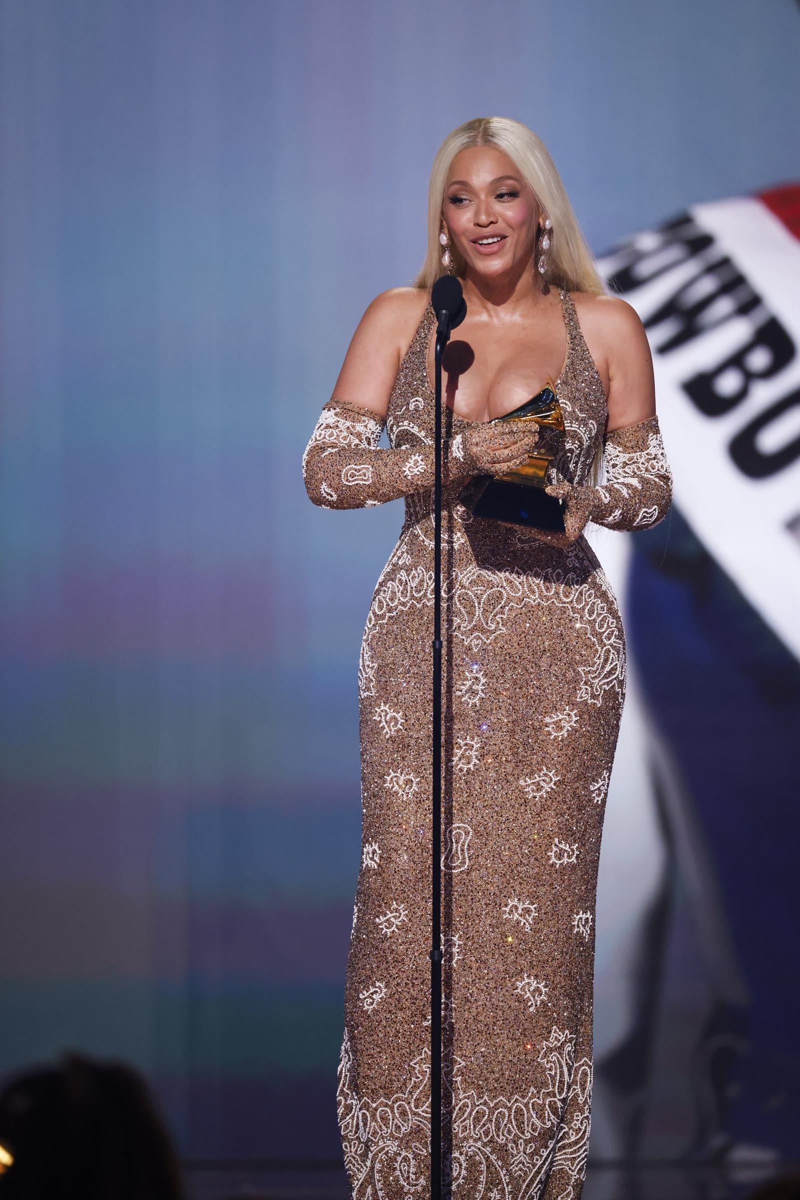 Beyoncé speaks on stage at the 67th Annual Grammy Awards. | Source: Getty Images