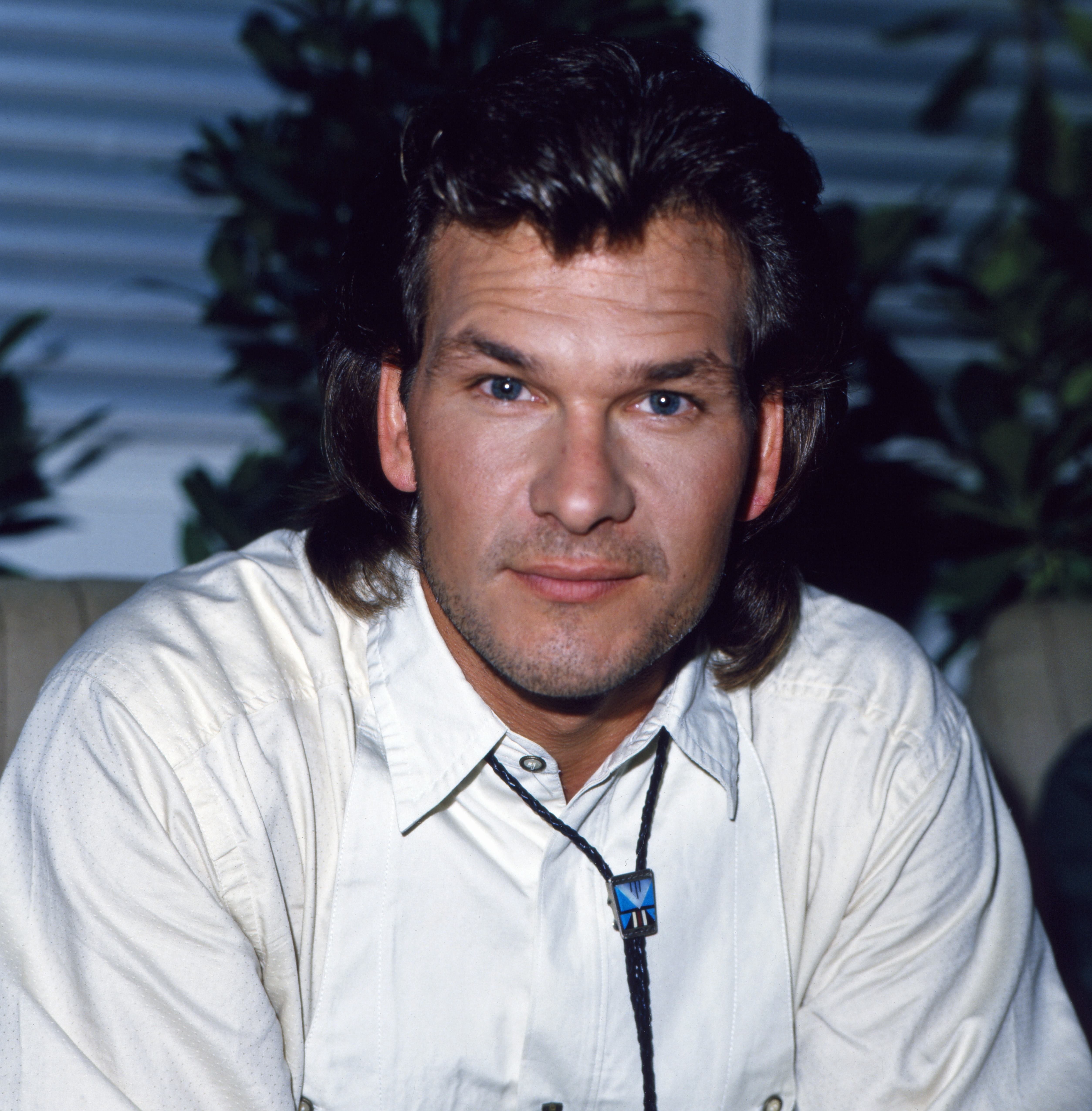 Patrick Swayze posing for a portrait in the 1980s | Source: Getty Images