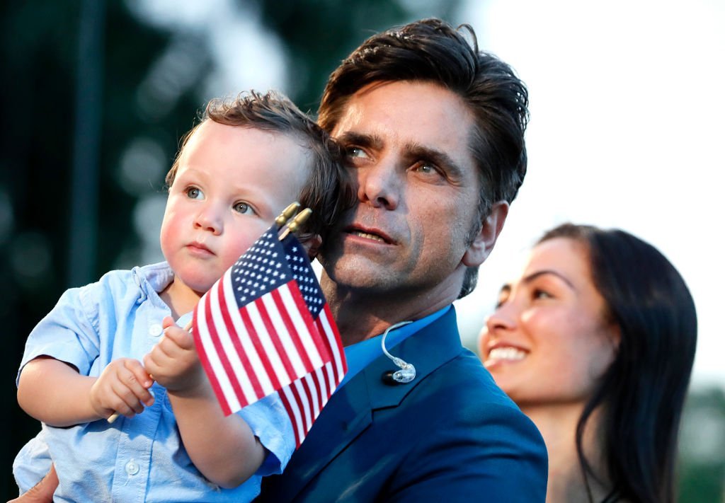 John Stamos & wife Caitlin McHugh with their son Billy Stamos during ‘A Capitol Fourth’ rehearsals on July 03, 2019 in Washington, DC. |Photo: Getty Images