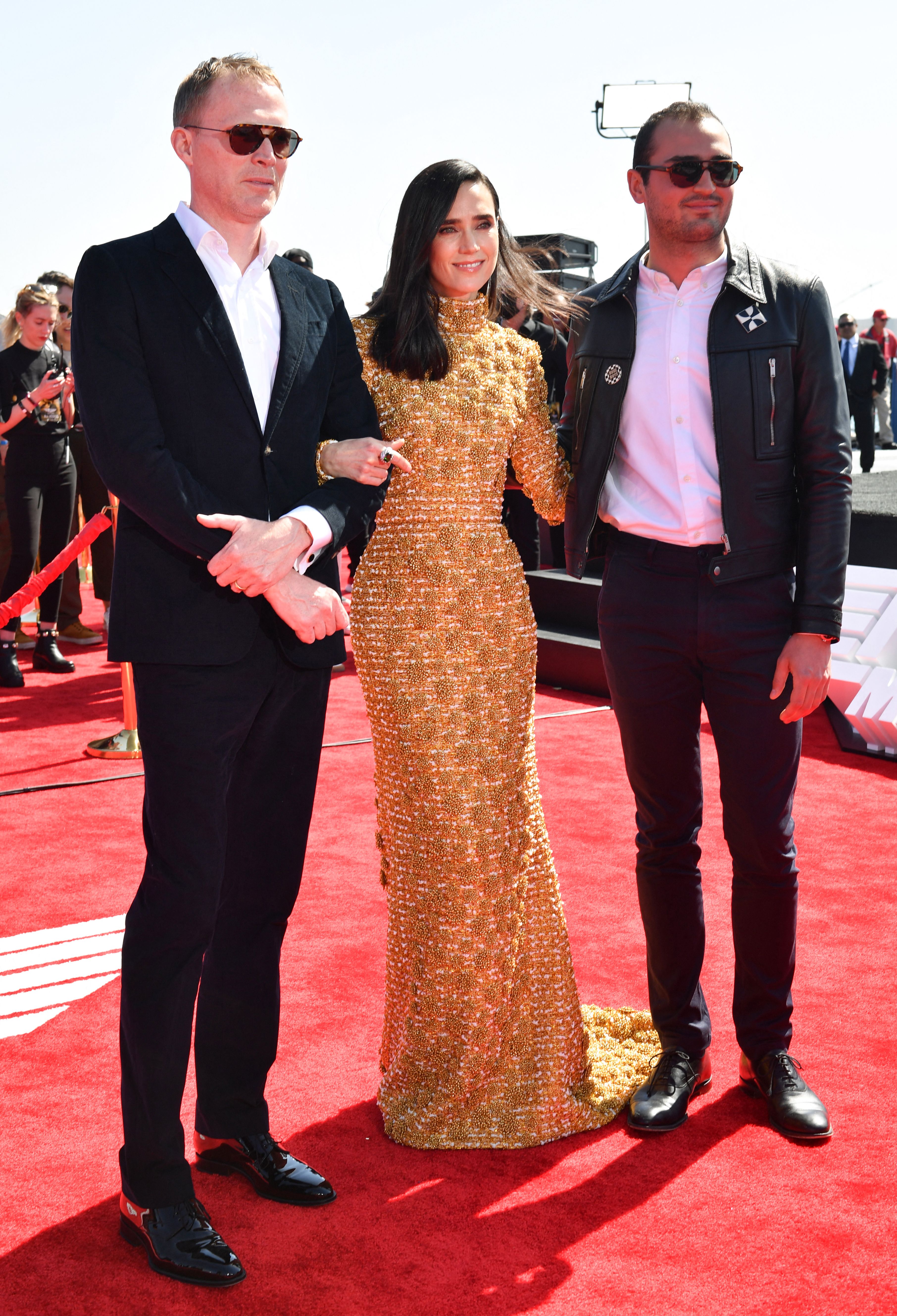 English actor Paul Bettany with his wife Jennifer Connelly and her son Kai Dugan at the world premiere of "Top Gun: Maverick!" aboard the USS Midway on May 4, 2022 in San Diego, California | Source: Getty Images
