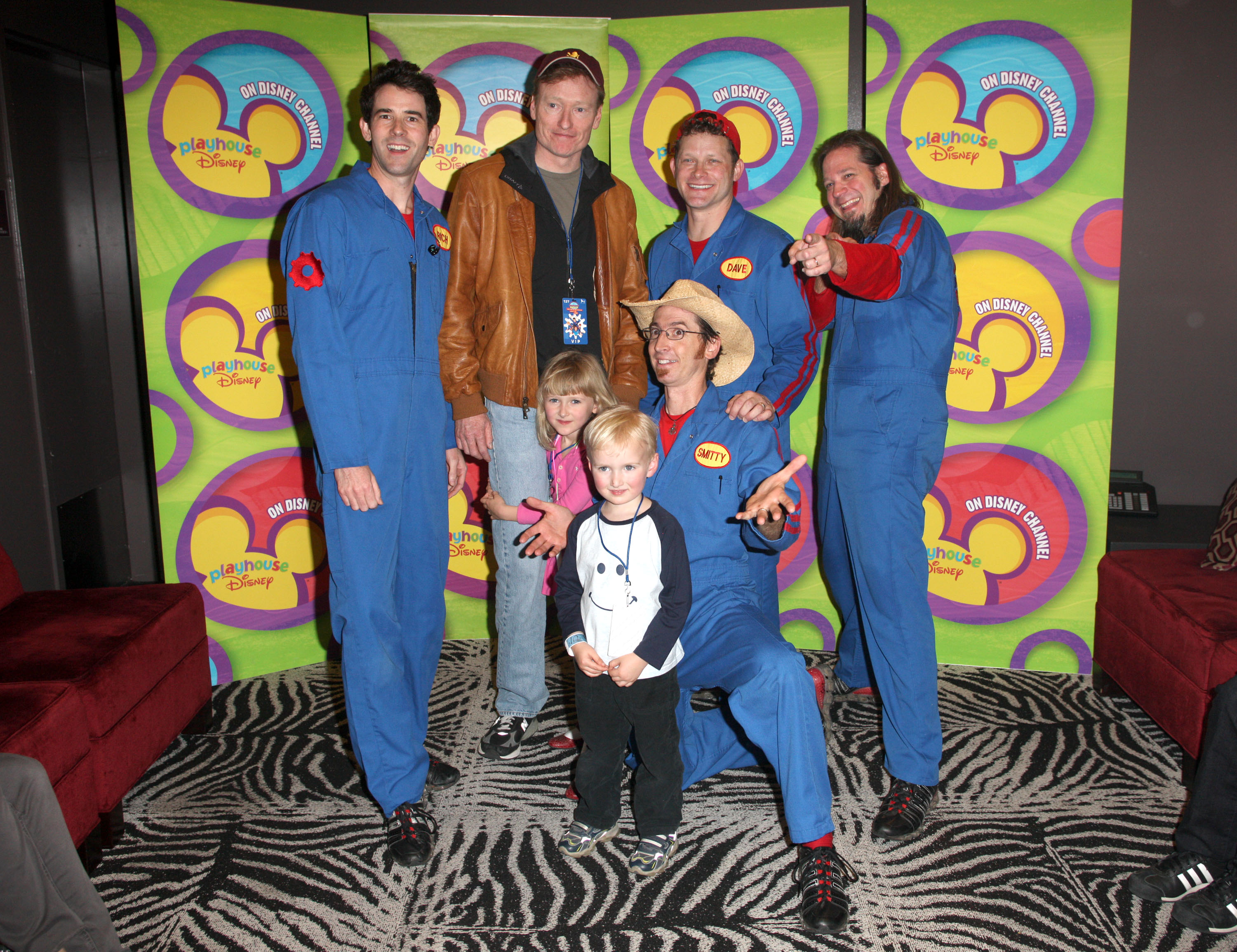 Rich Collins, Conan O'Brien, Neve O'Brien, Beckett O'Brien, Scott Smith, David Poche, and Scott Durbin with Disney's Imagination Movers at their first-ever U.S. concert tour on December 5, 2009, in Los Angeles | Source: Getty Images