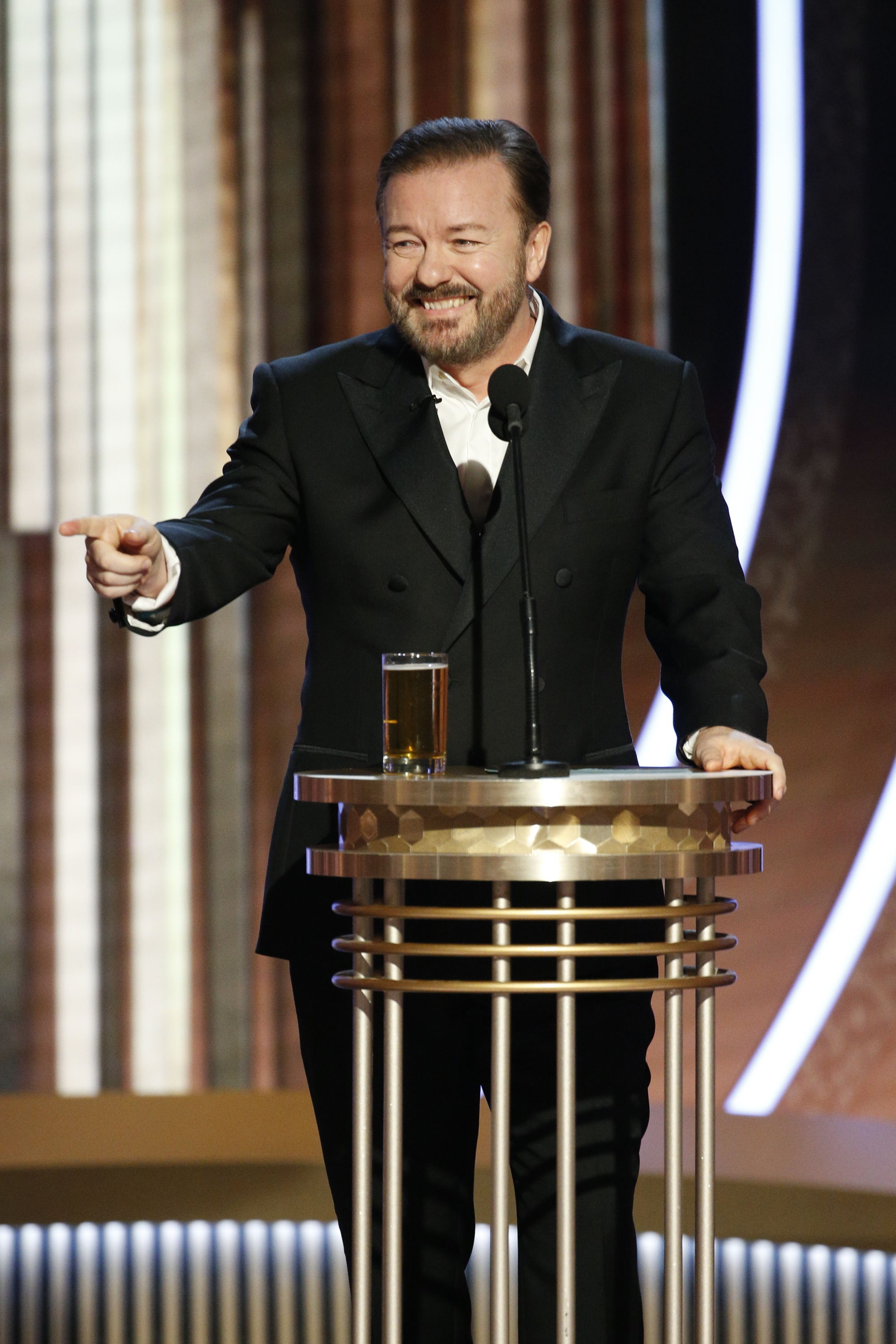 Ricky Gervais speaks onstage during the 77th Annual Golden Globe Awards at The Beverly Hilton Hotel on January 5, 2020, in Beverly Hills, California. | Source: Getty Images