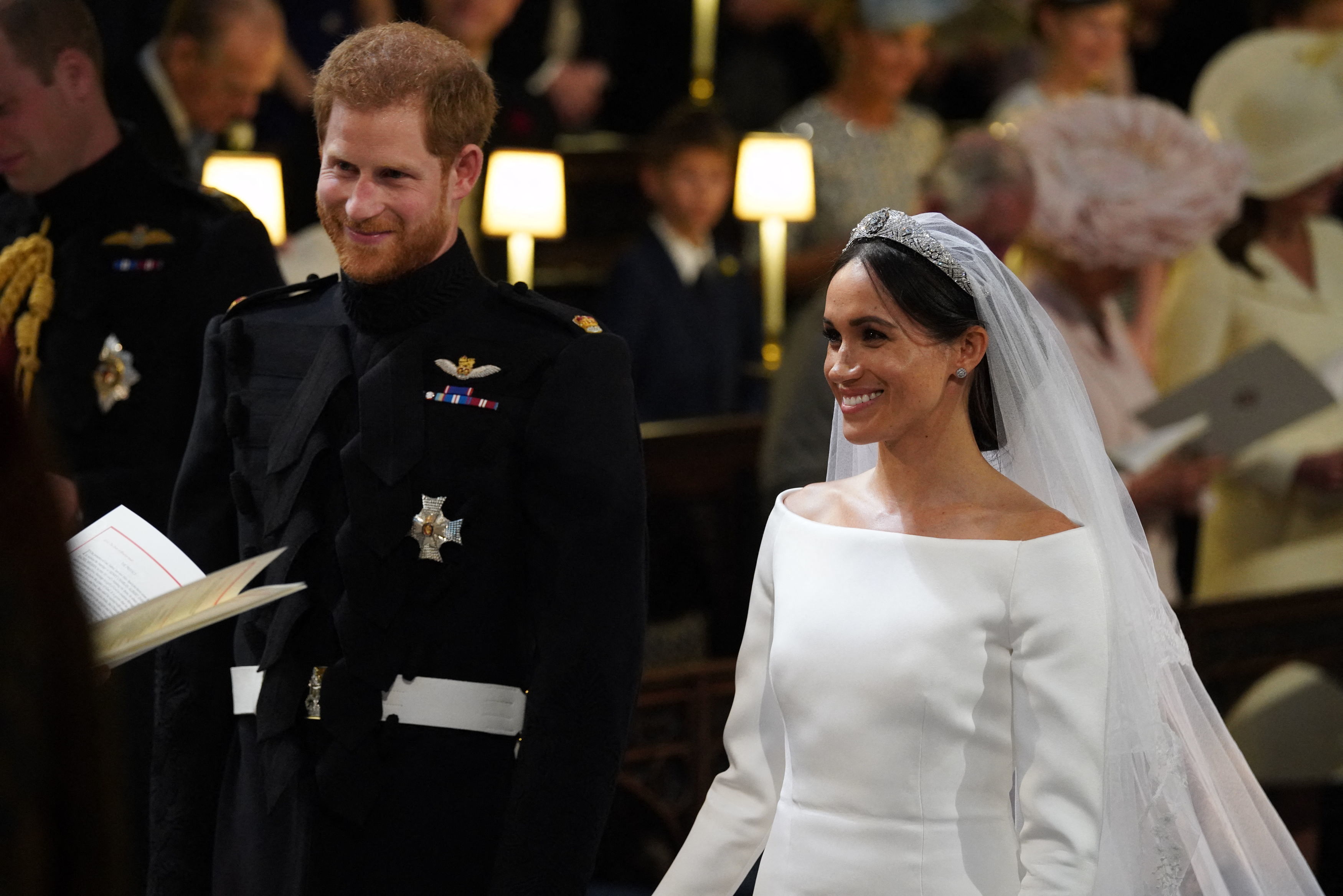 Prince Harry, Duke of Sussex and Meghan, Duchess of Sussex arrive at the High Altar for their wedding ceremony in St George's Chapel, Windsor Castle, on May 19, 2018. | Source: Getty Images