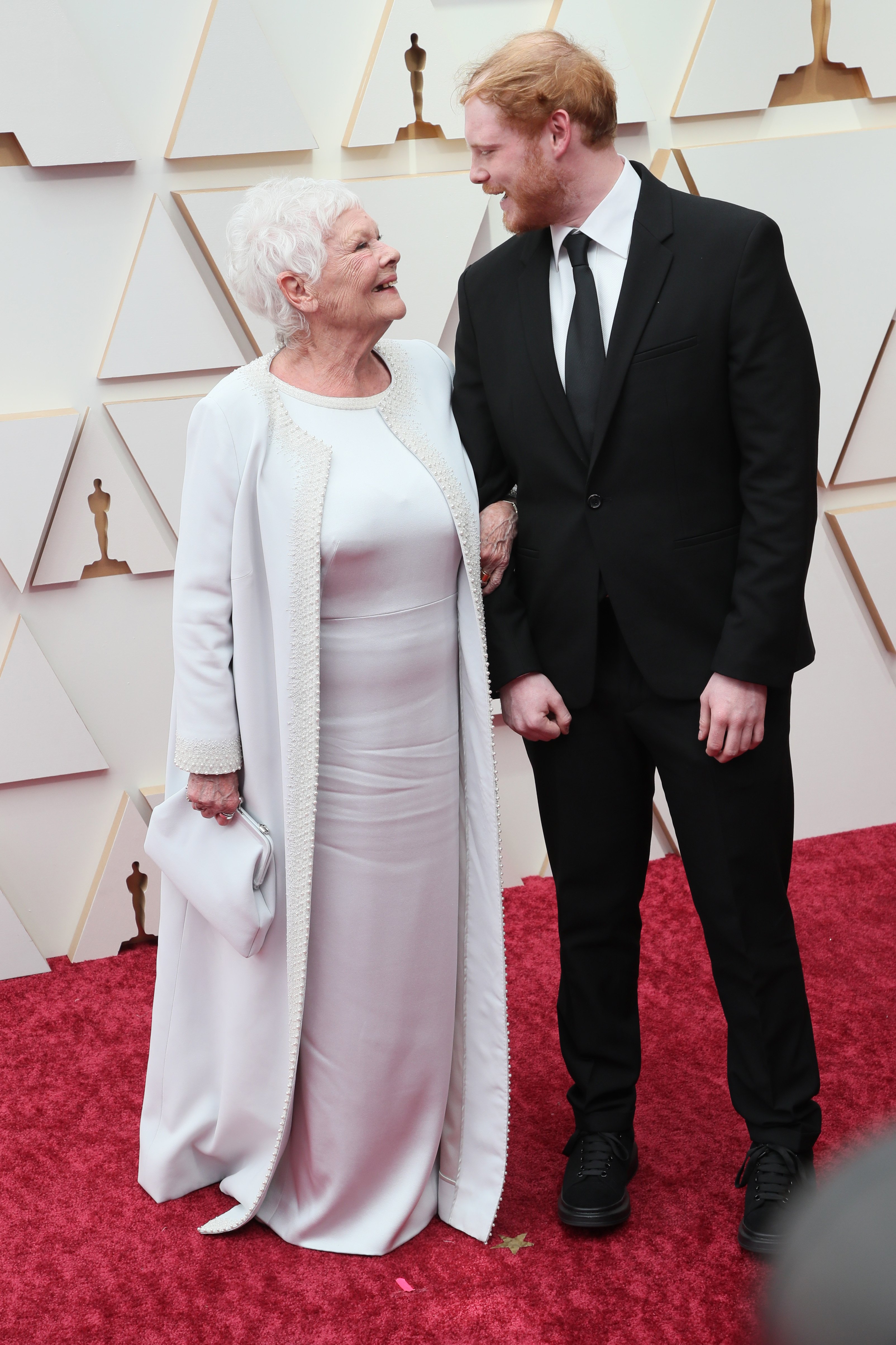 Judi Dench and Sam Williams attend the 94th Annual Academy Awards at Hollywood and Highland on March 27, 2022 in Hollywood, California | Source: Getty Images 