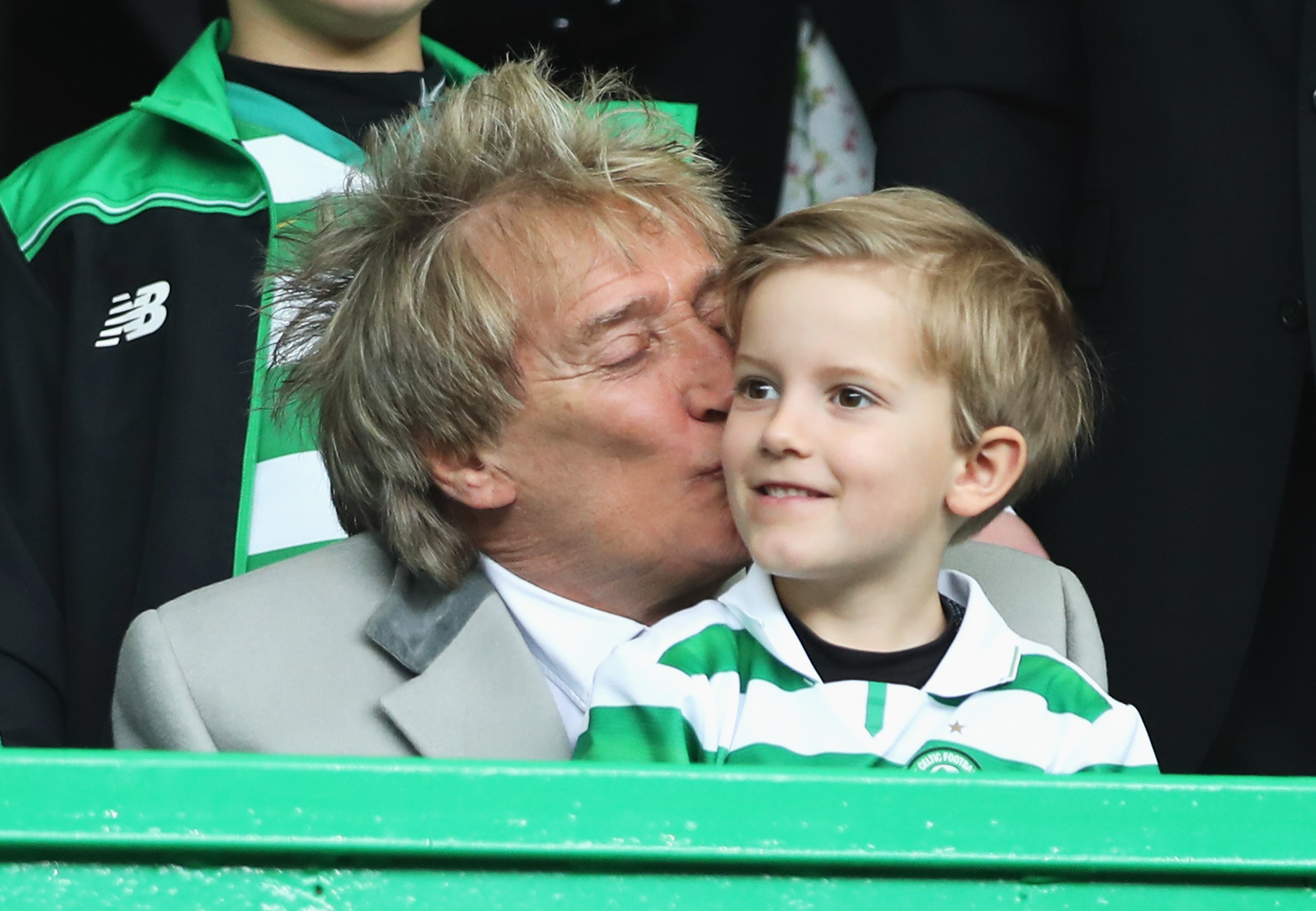 Rod Stewart kissing his son, Aiden, in the stands prior to the Ladbrokes Scottish Premiership match between Celtic and Rangers at Celtic Park on March 12, 2017, in Glasgow, Scotland. | Source: Getty Images