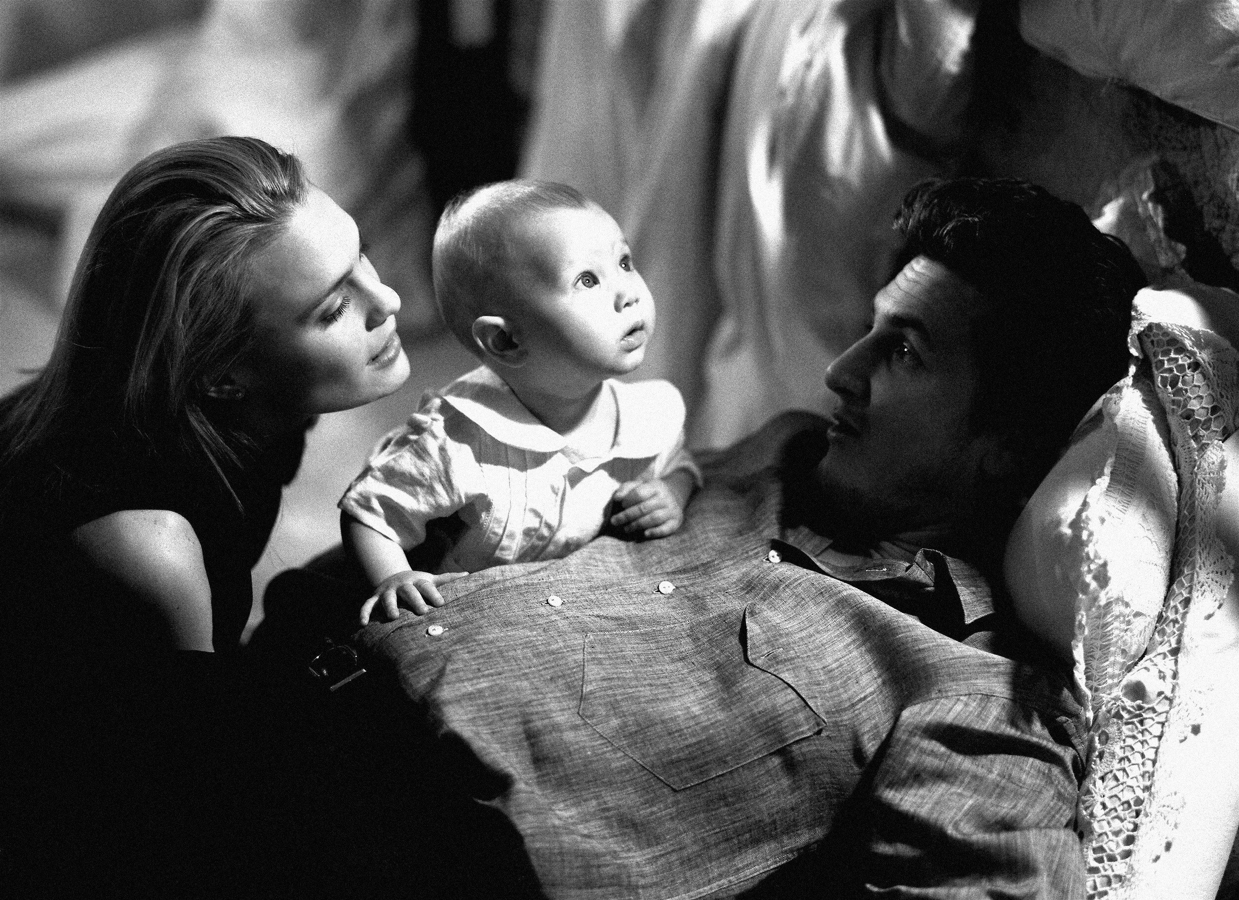 Sean Penn and his girlfriend Robin Wright with their baby daughter Dylan at their residence on January 1, 1991 in Malibu, California