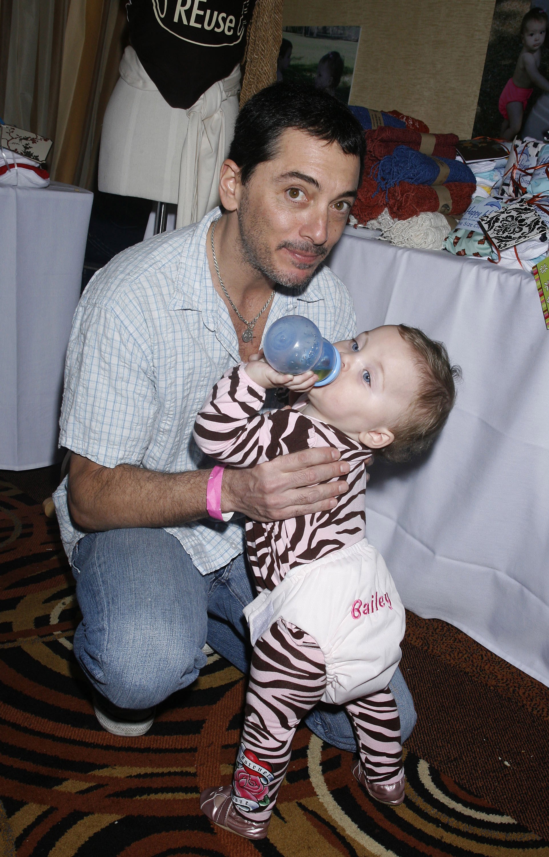 Scott Baio and daughter Bailey pose at the the Boom Boom Room's Children's Gifting Wonderland at Century Plaza Hotel on January 10, 2009 in Los Angeles, California | Source: Getty Images 