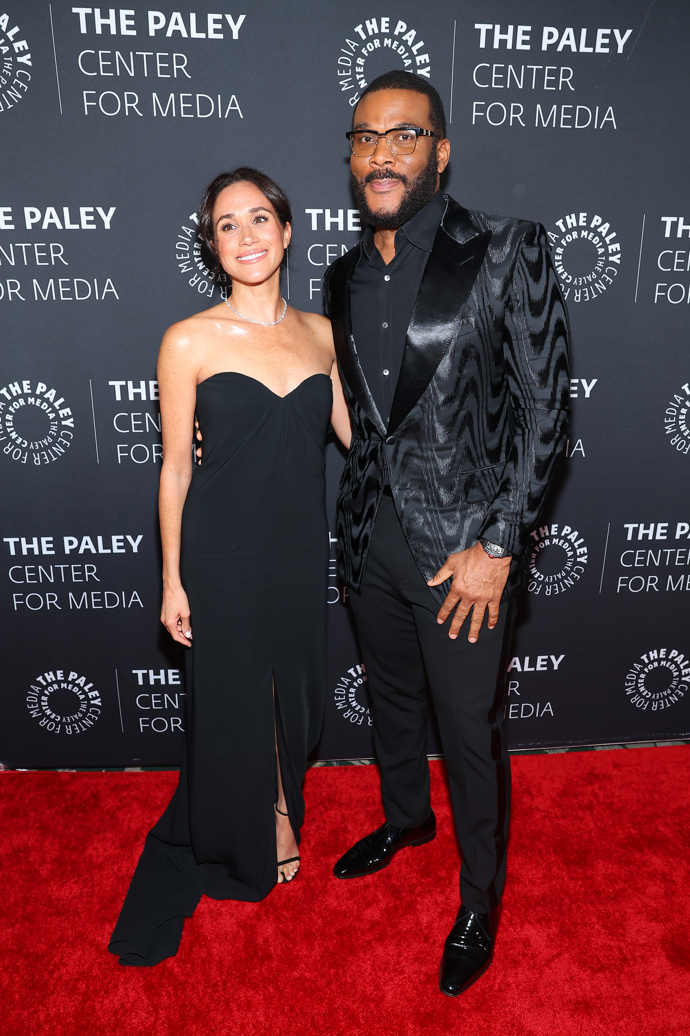 Meghan Markle and Tyler Perry. | Source: Getty Images