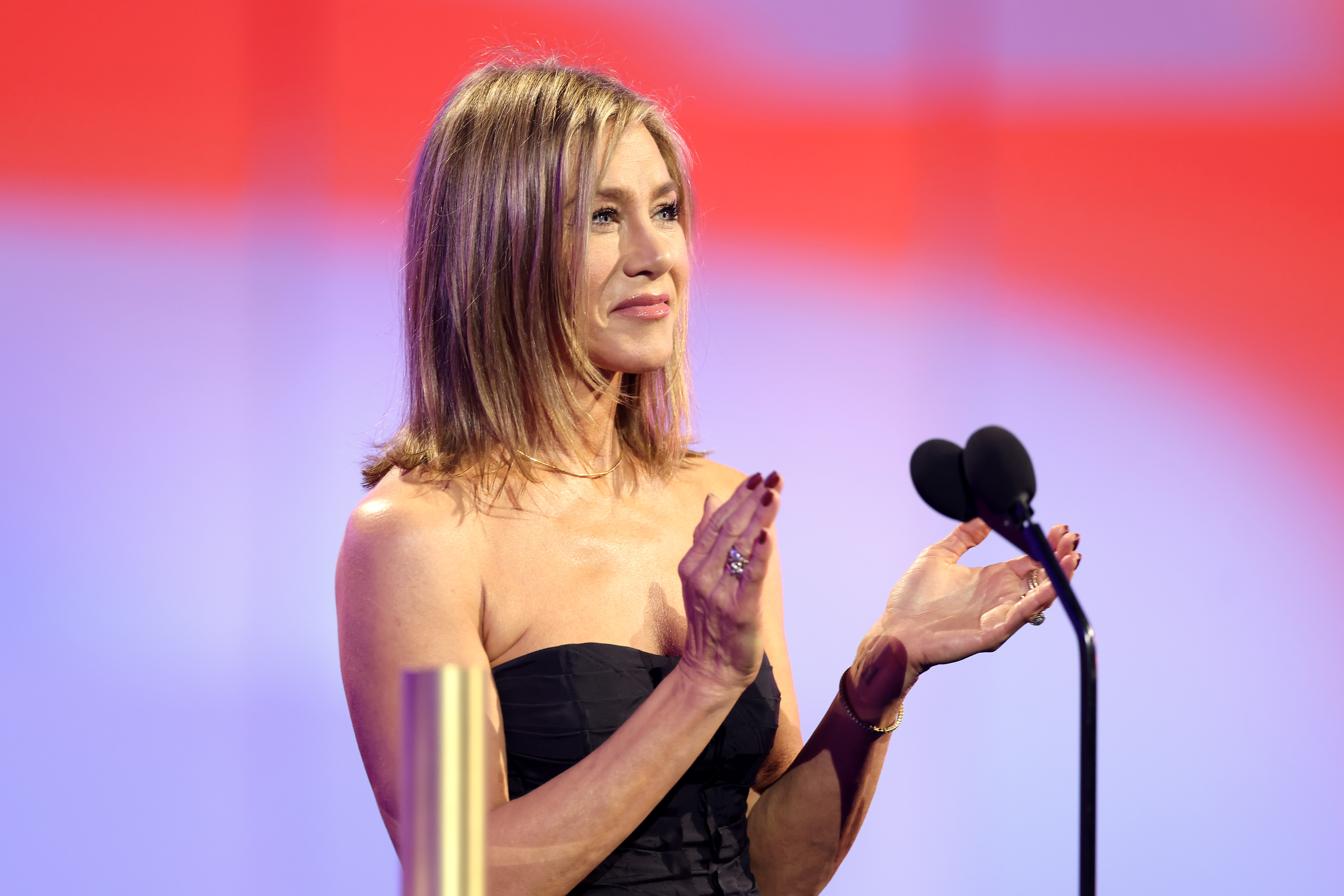 Jennifer Aniston speaks onstage during the People's Choice Awards held at Barker Hangar in Santa Monica, California, on February 18, 2024. | Source: Getty Images
