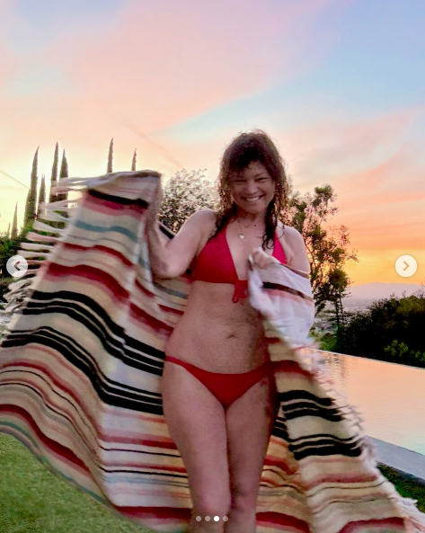Valerie Bertinelli posing in her red bikini. | Source: Instagram/wolfiesmom