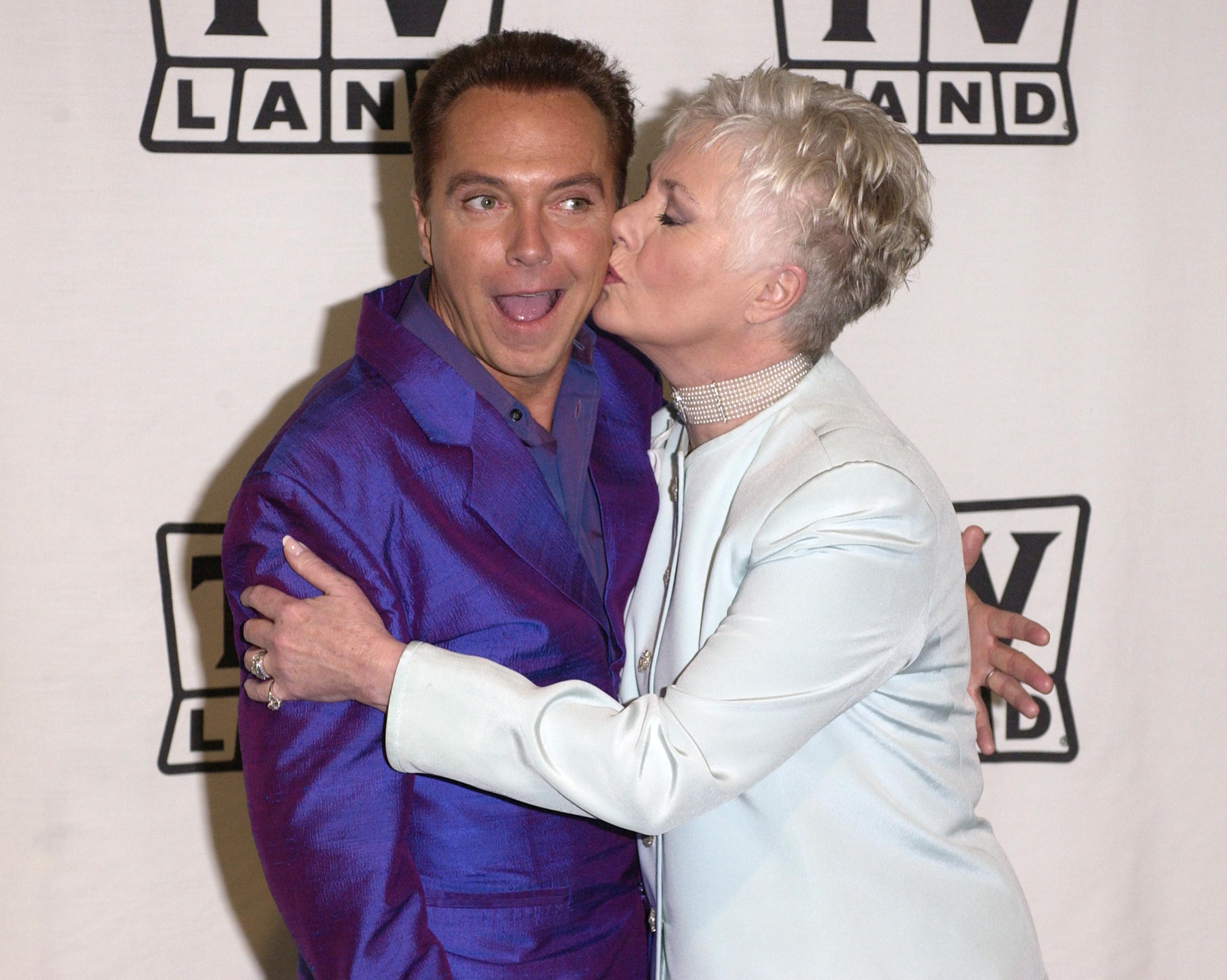 David Cassidy gets a kiss Shirley Jones backstage during the TV Land Awards 2003 at the Hollywood Palladium on March 2, 2003 in Hollywood, California. | Photo: Getty Images