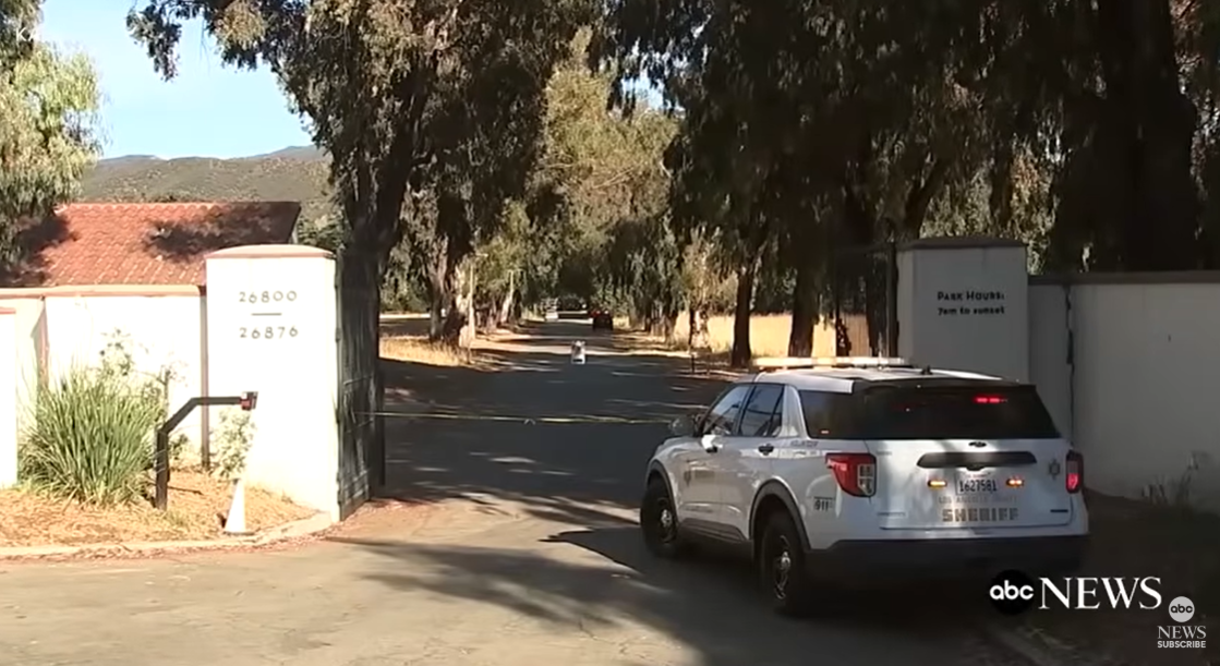 A police vehicle blocks the entrance to King Gillette Ranch following the fatal tree branch incident, as posted on July 11, 2025 | Source : YouTube/ABCNews