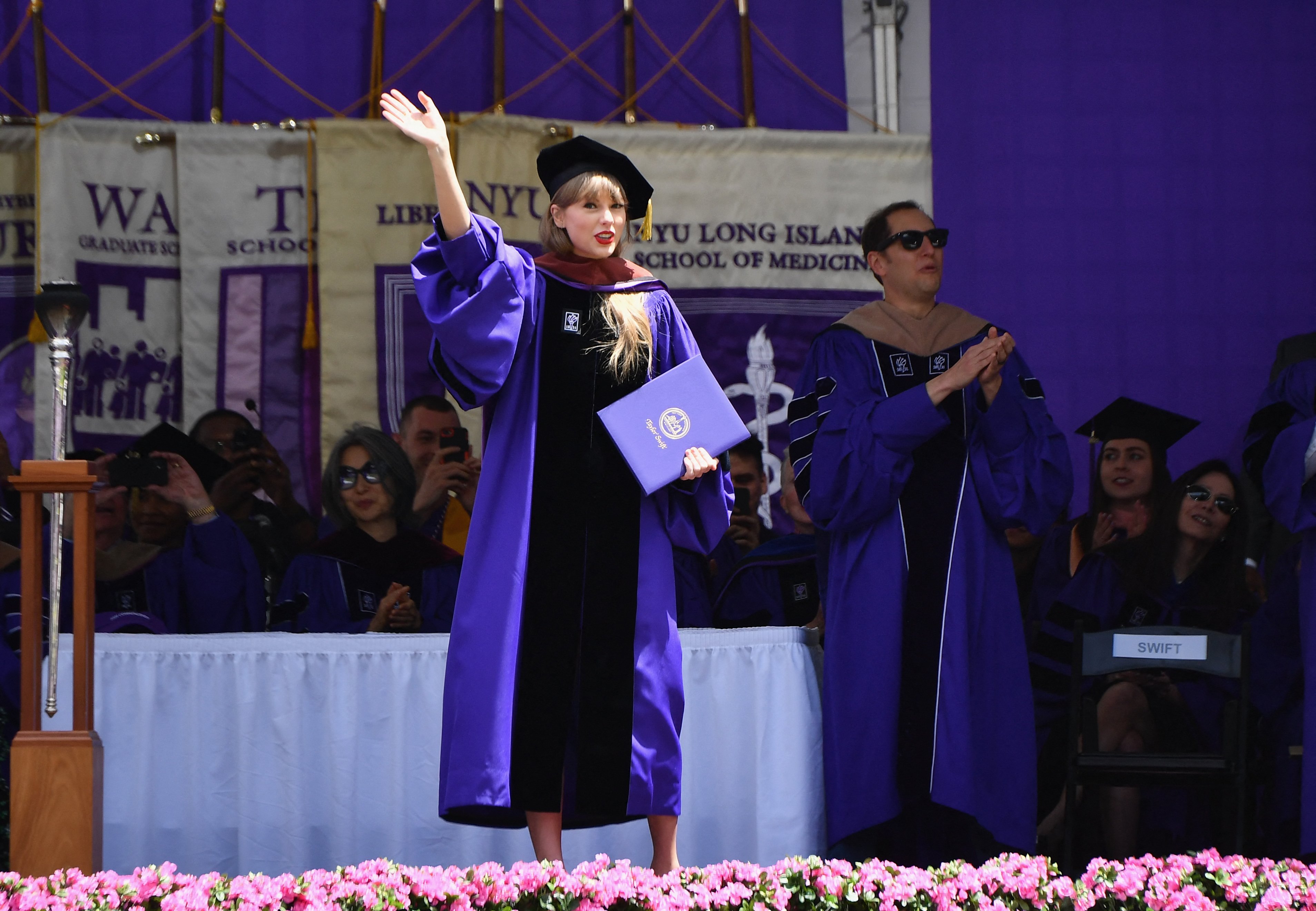 Taylor Swift receives an honorary doctorate of fine arts during New York University's commencement rites for the class of 2022 at Yankee Stadium in New York City on May 18, 2022. | Source: Getty Images