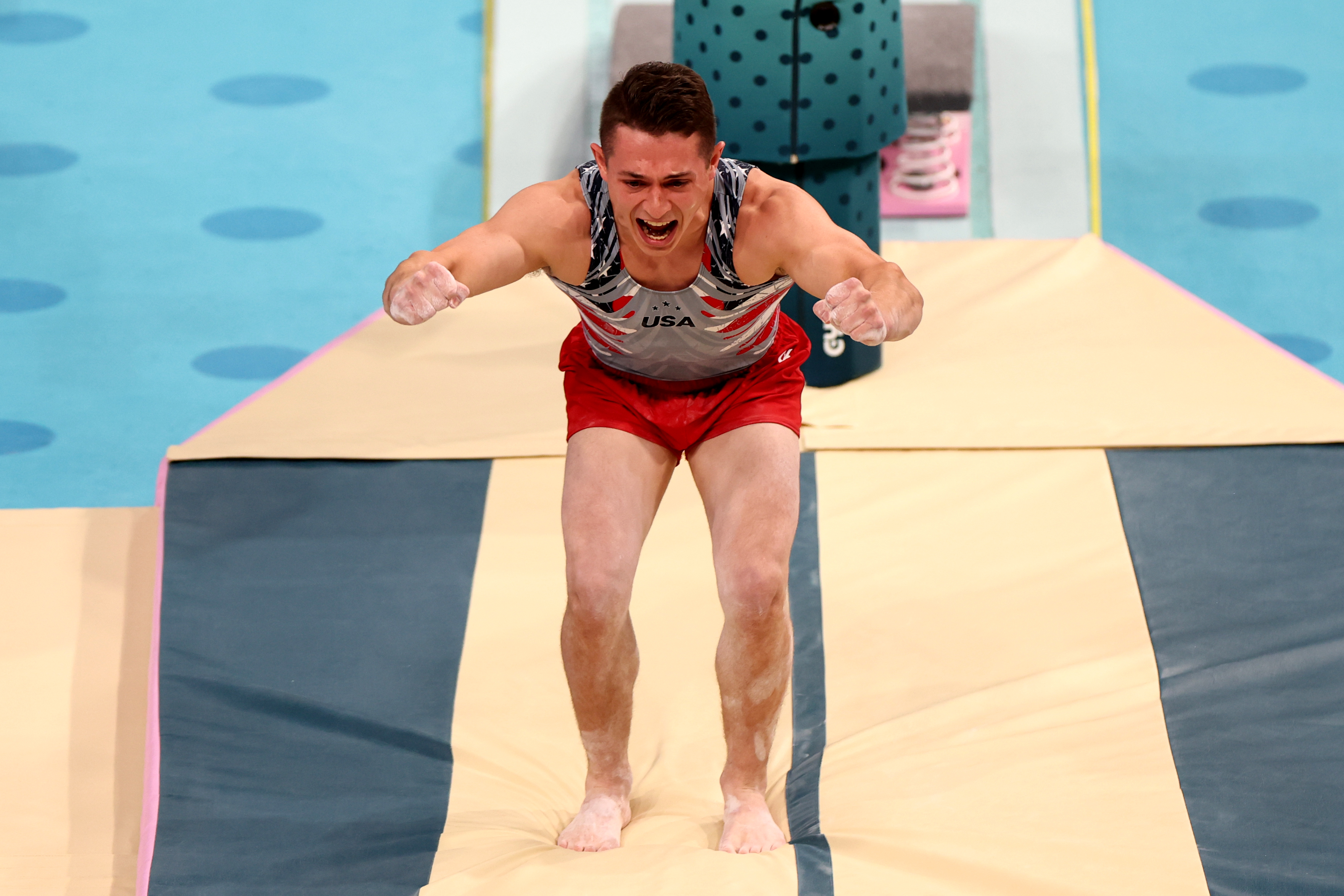 Paul Juda celebrates after his vault routine during the Men's Team Final at the Paris 2024 Olympics on July 29, 2024 | Source: Getty Images