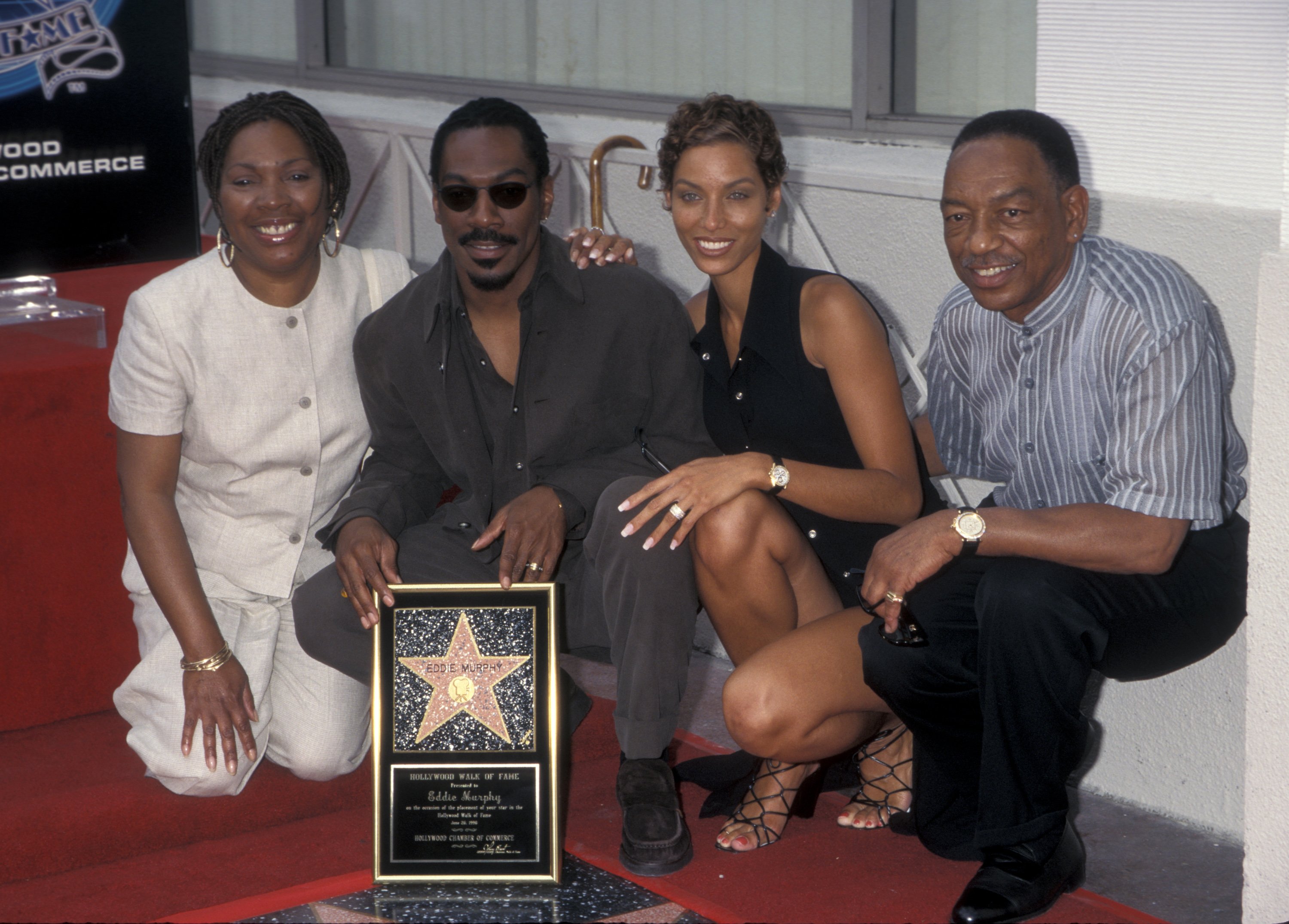 Lillian Murphy Lynch, Eddie Murphy, Nicole Mitchell Murphy and Vernon Lynch at the honoring of Eddie with a star on the Hollywood Walk of Fame | Source: Getty Images