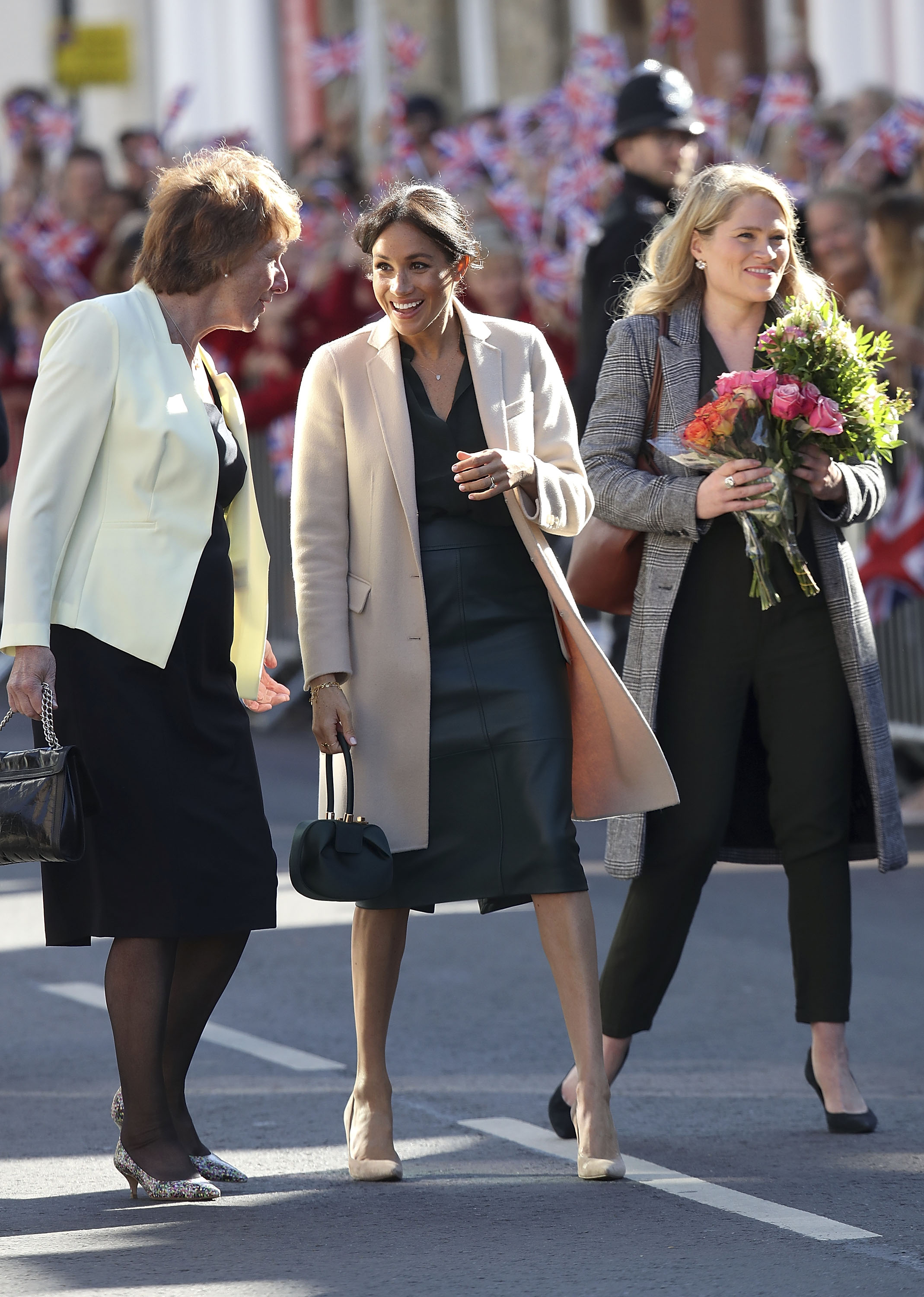 Meghan Markle  an official visit to Sussex with her assistant Amy Pickerill and another woman on October 3, 2018 in Chichester, United Kingdom | Source: Getty Images