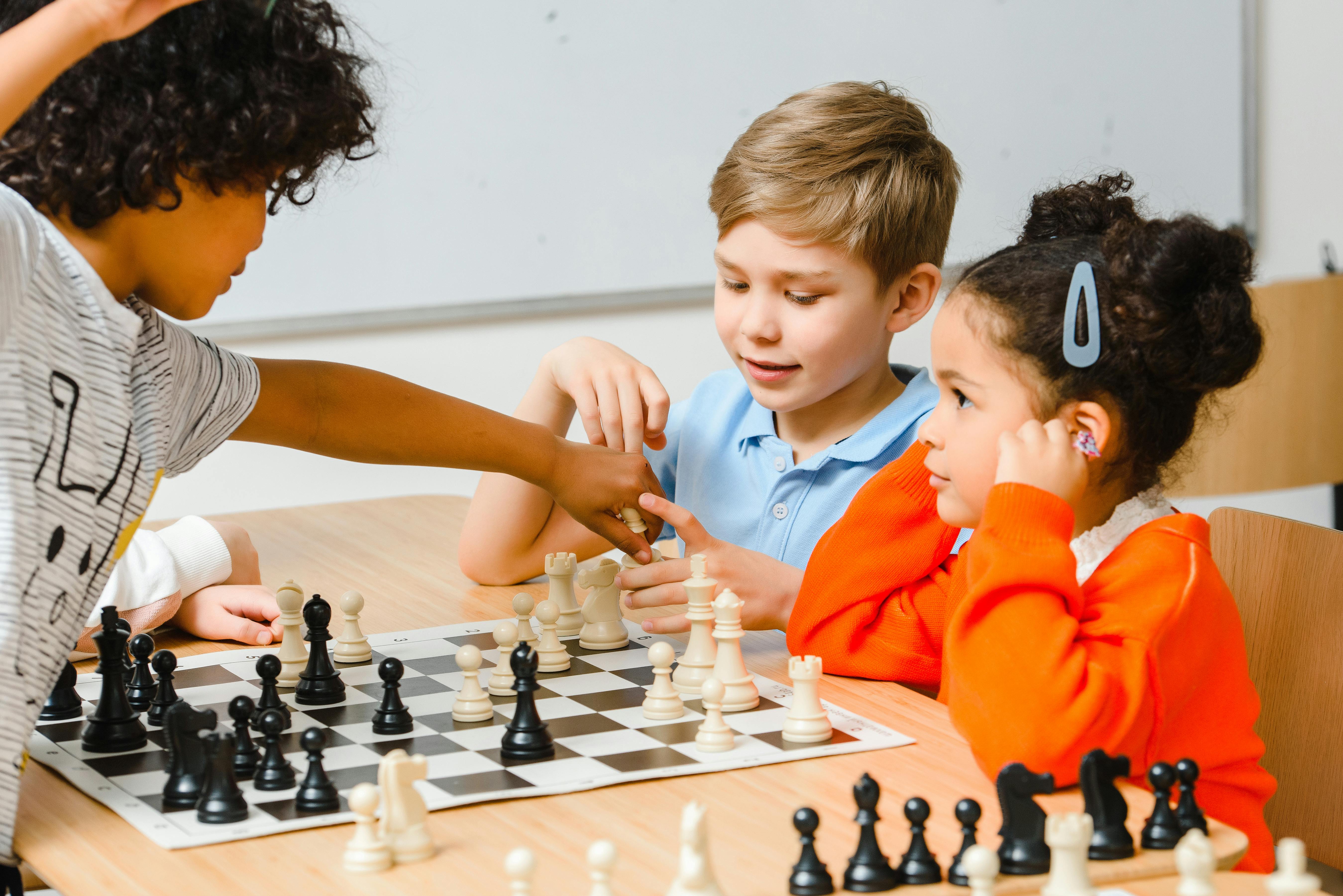 Children playing chess together | Source: Pexels