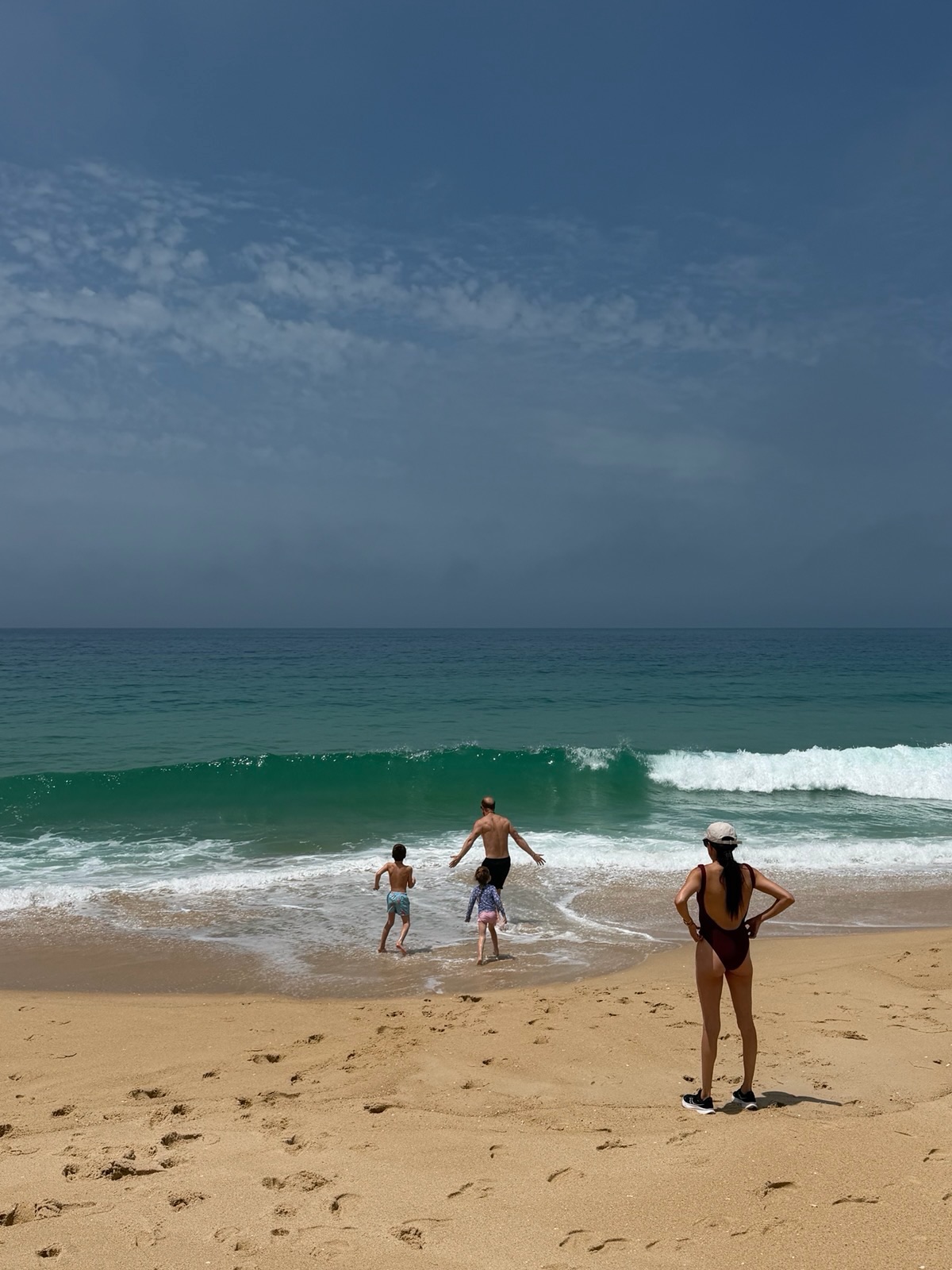 Beach time featured prominently in the Sussexes' summer update. Meghan's carousel showed the family balancing travel, outdoor activities, and time together away from public duties. | Source: Instagram/meghan