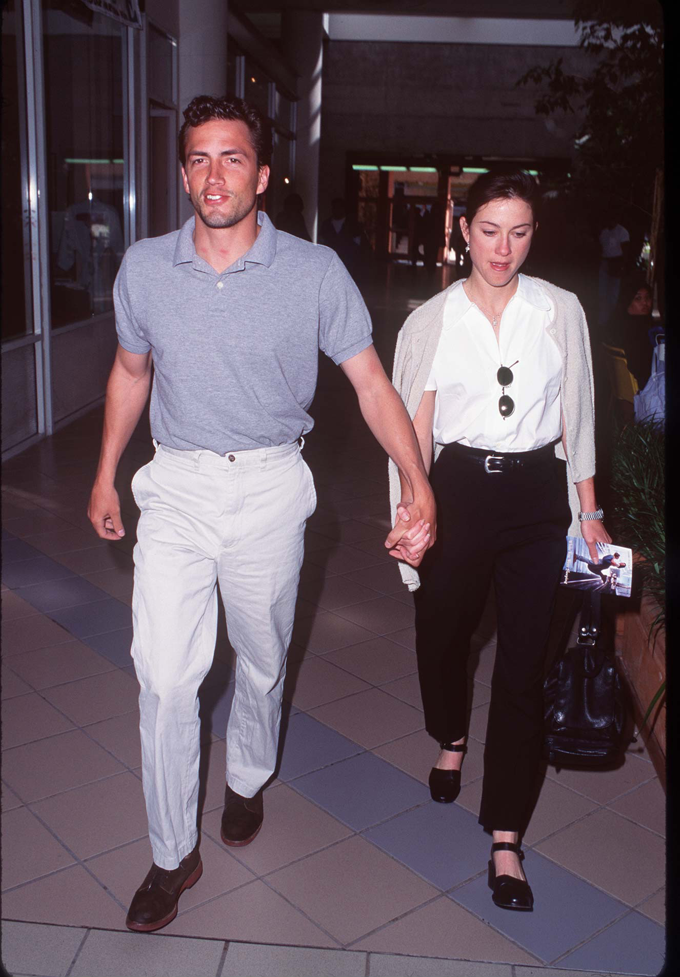 The actor is seen walking hand-in-hand with his then-wife, Jennifer Hageney, circa 1994 | Source: Getty Images | Source: Getty Images