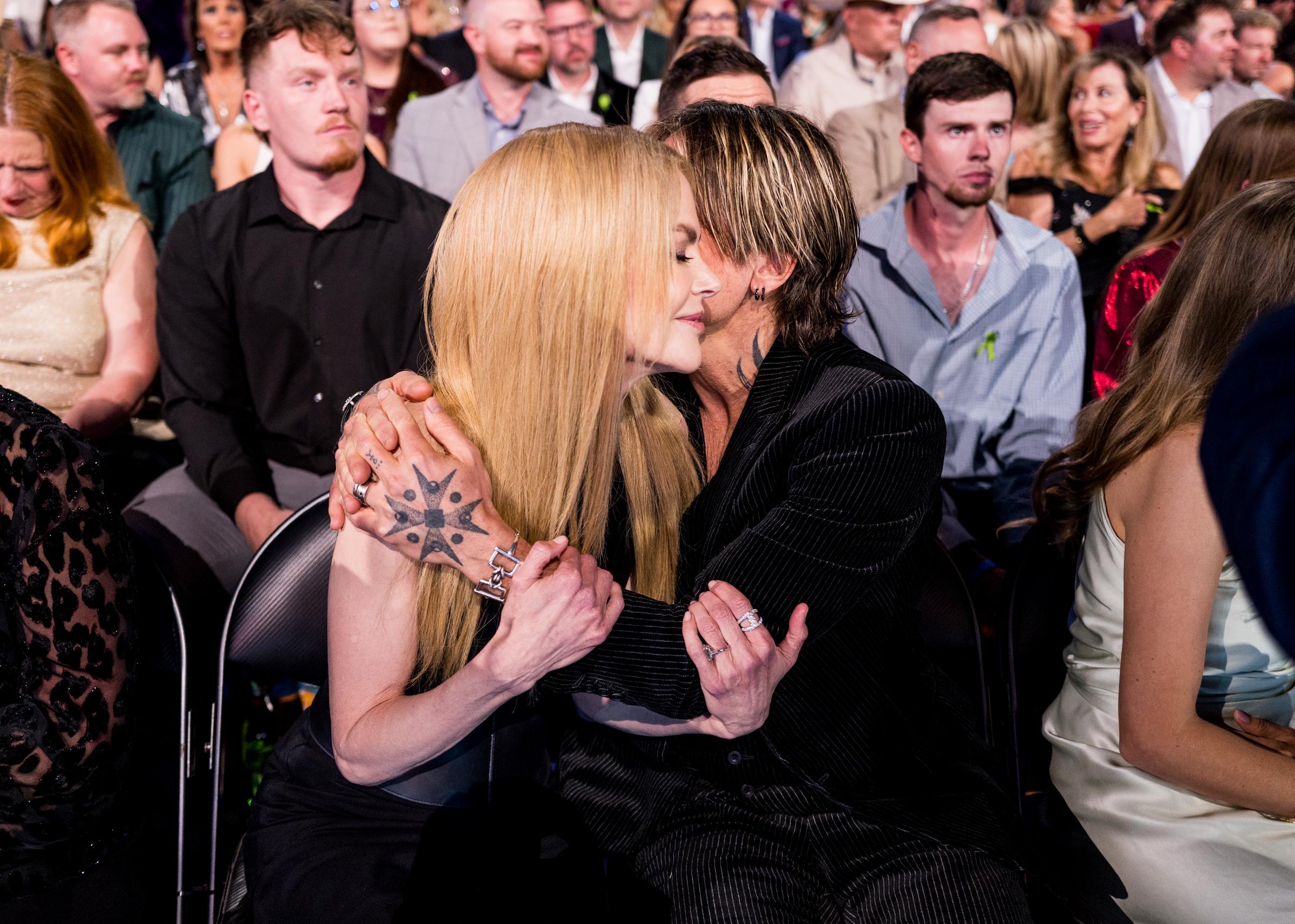 Keith Urban embraces Nicole Kidman in the audience at the 60th Academy of Country Music Awards in Frisco, Texas, on May 8, 2025 | Source: Getty Images