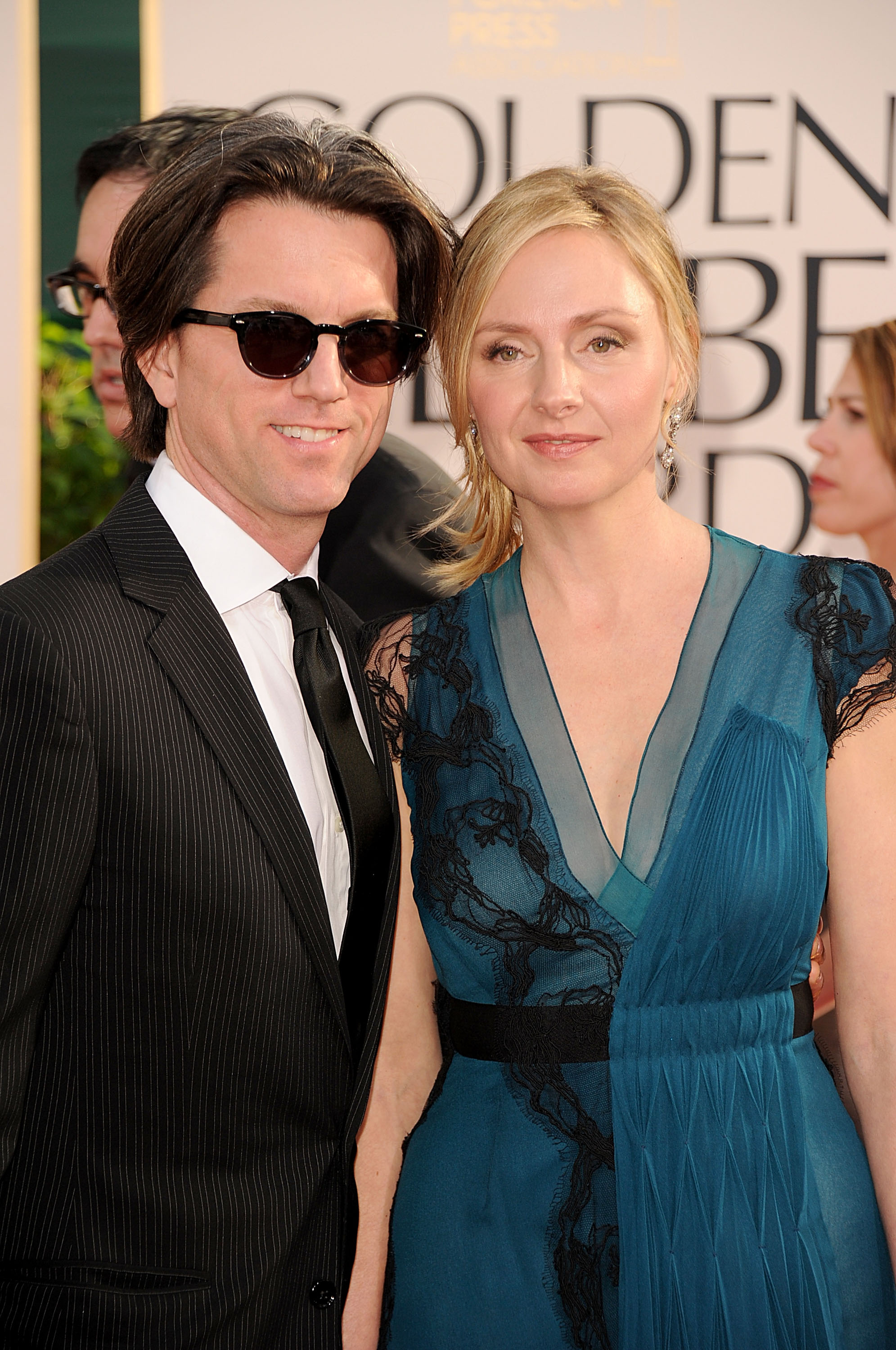 Jon Patrick Walker and Hope Davis at the 68th Annual Golden Globe Awards on January 16, 2011, in Beverly Hills | Source: Getty Images