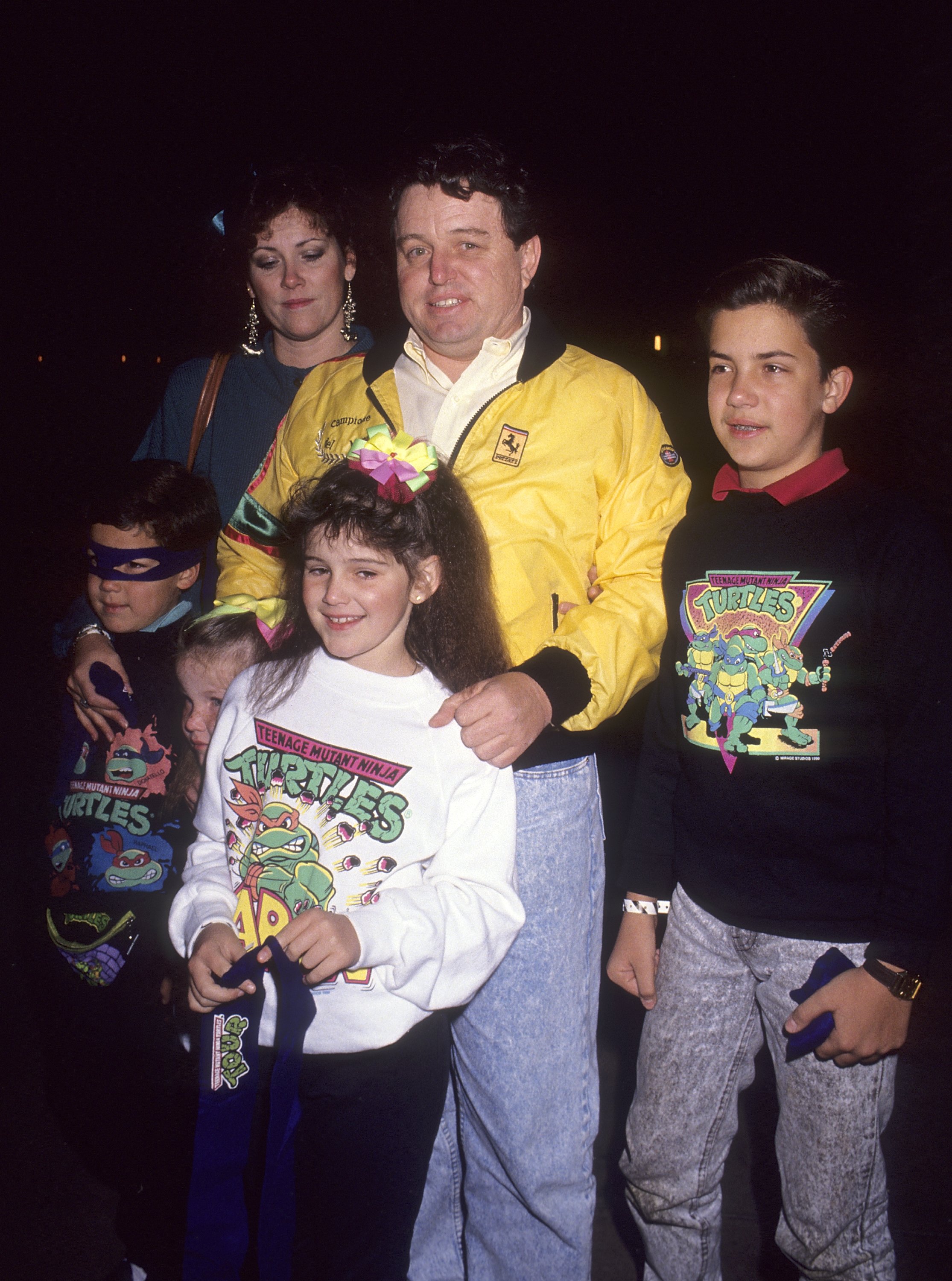 Actor Jerry Mathers, wife Rhonda and children attend the Teenage Mutant Ninja Turtle's "Coming Out of Their Shells" Rock & Roll Tour on November 21, 1990 at the Universal Amphitheatre in Universal City, California. | Source: Getty Images 
