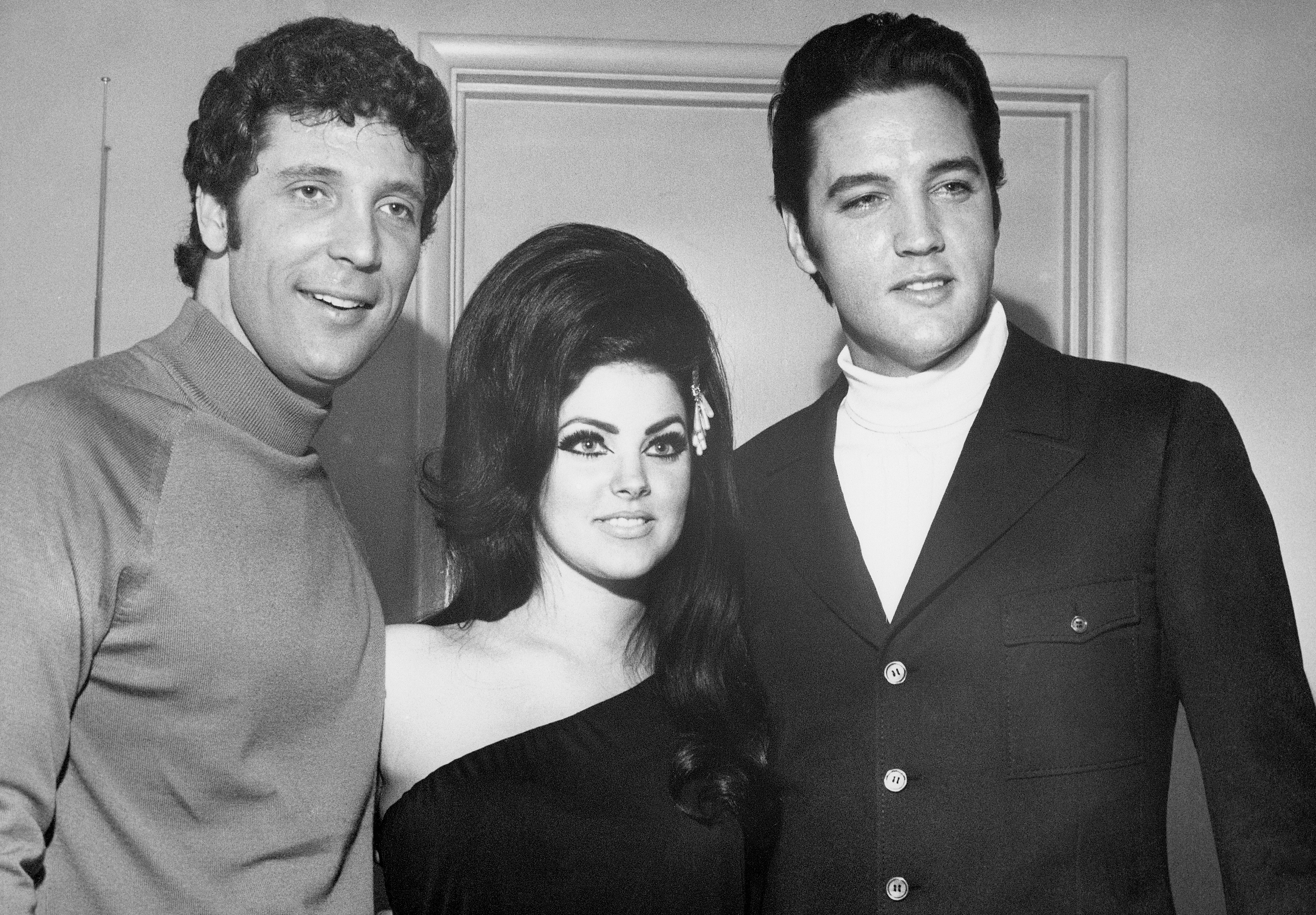 Tom Jones (left), Priscilla Presley (middle), and Elvis Presley's (right) in Las Vegas in 1968 | Source: Getty Images