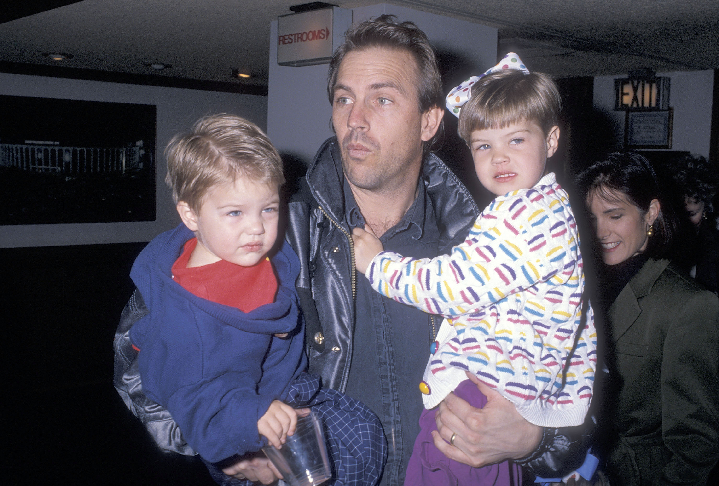 Kevin Costner, son Joe Costner, and daughter Lily Costner at the Moscow Circus opening night performance on March 14, 1990 at the Great Western Forum in Inglewood, California | Source: Getty Images