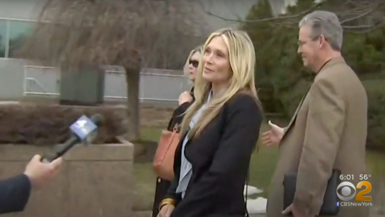 A screenshot of Amy Locane answering a reporter's question as she leaves court, posted on February 16, 2019 | Source: YouTube/CBS New York