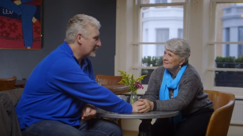 Picture of Bronwen Hook in a conversation her long lost son, Mark, during their reunion. | Source: Youtube/ITV