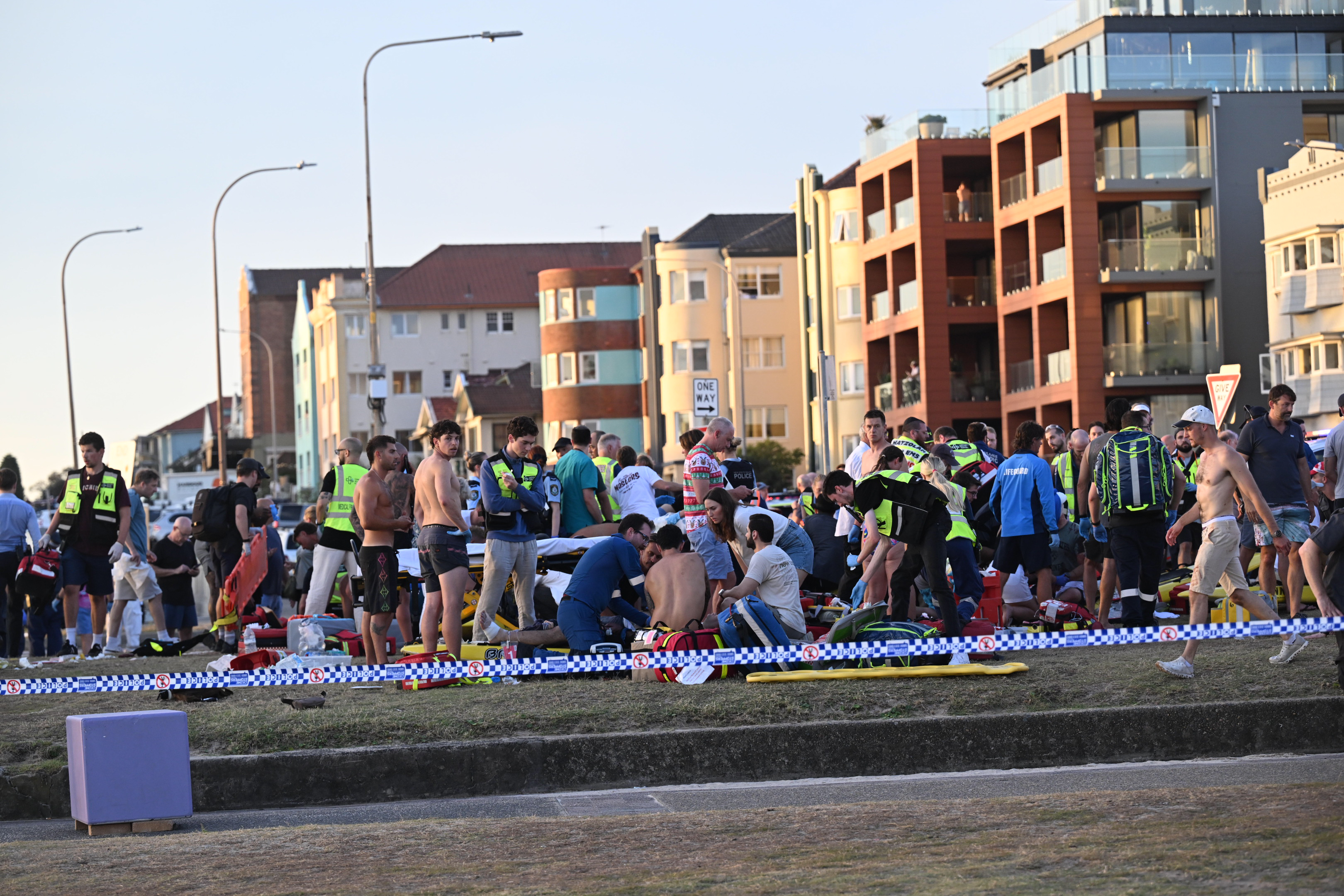 First responders treat victims on the ground at Bondi Beach after the mass shooting | Source: Getty Images