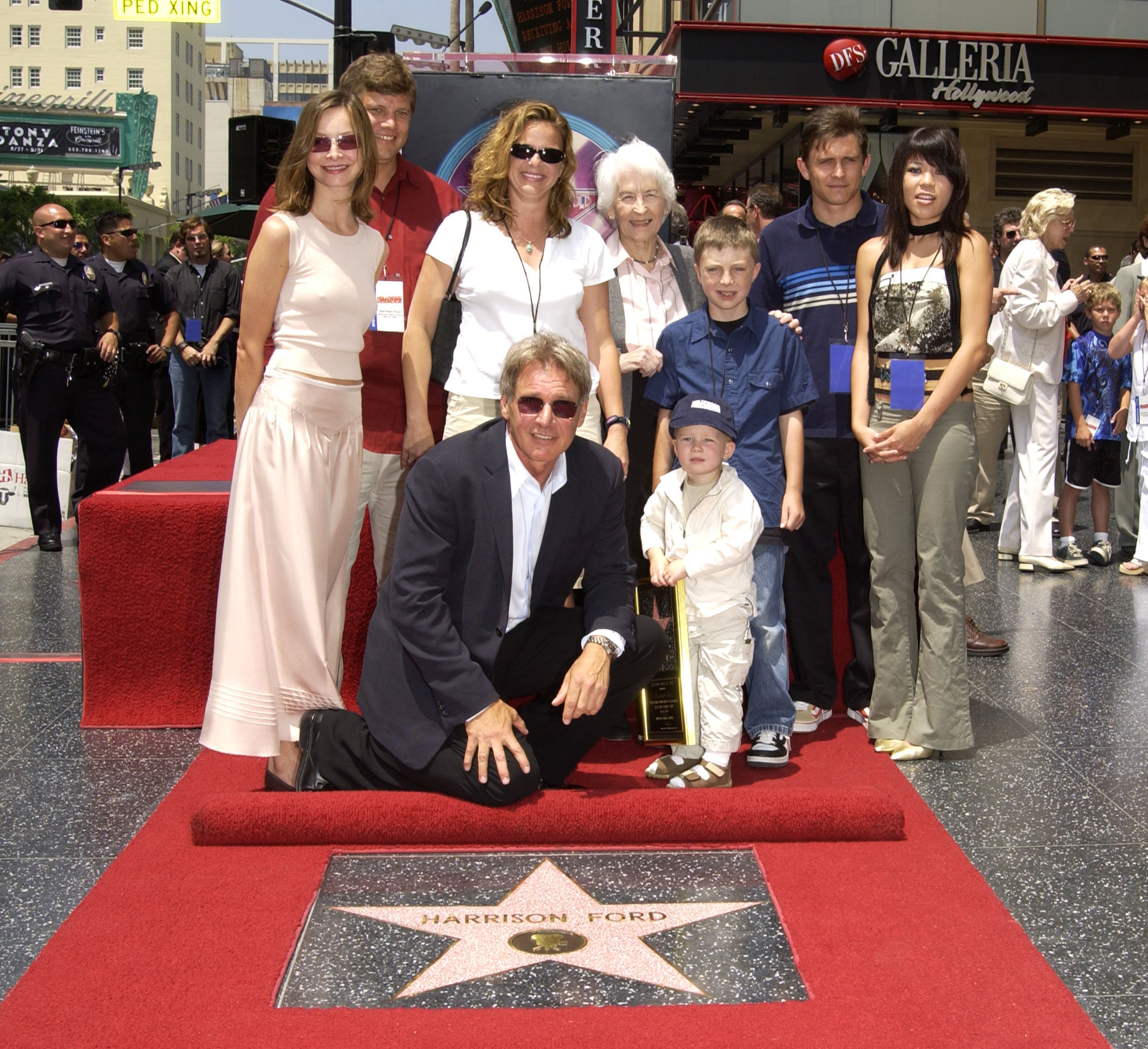 Harrison Ford, Calista Flockhart, and some of his family members as he's honored with a Star on the Hollywood Walk of Fame on May 30, 2003. | Source: Getty Images