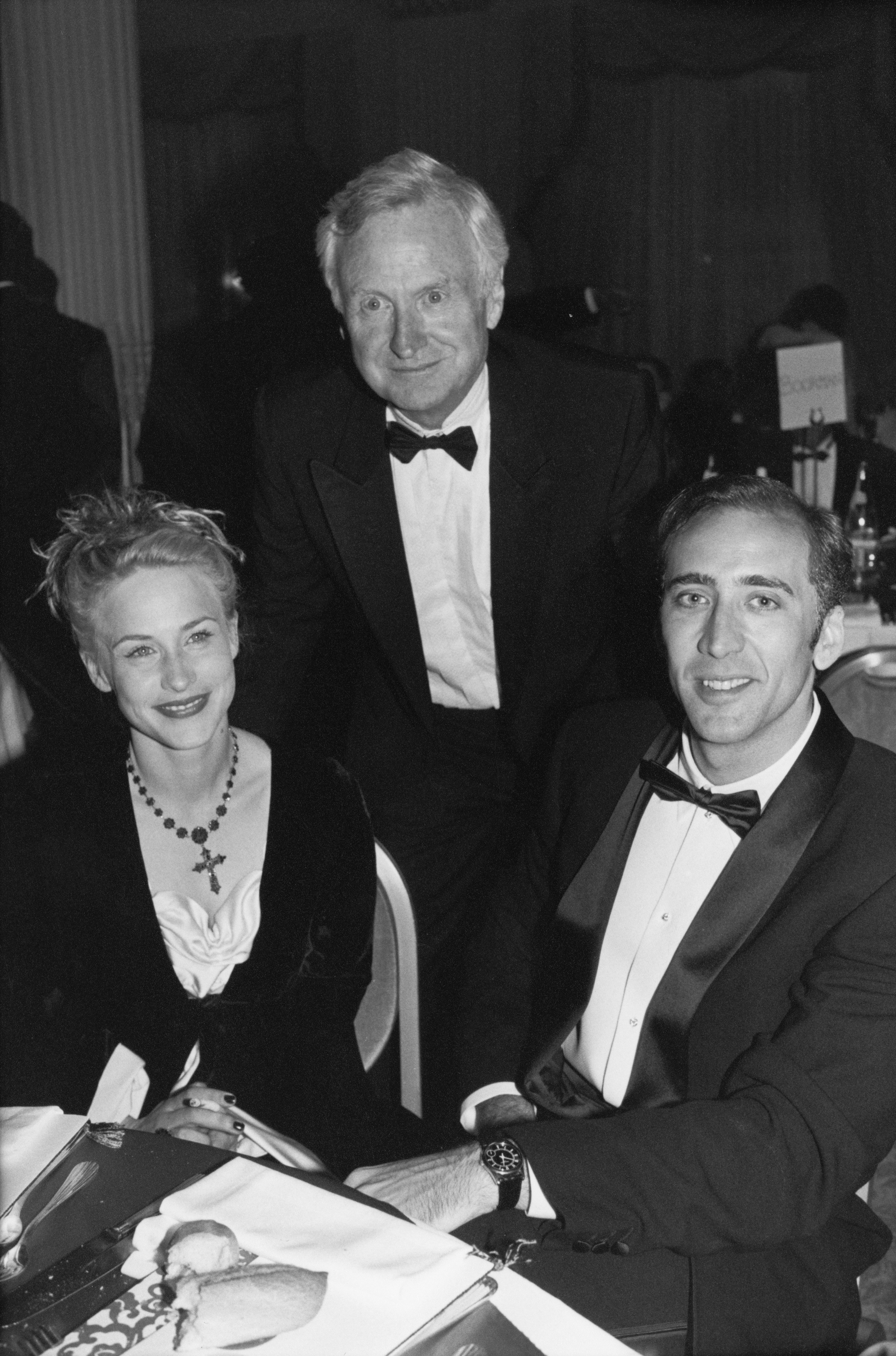 Patricia Arquette, John Boorman, and Nicolas Cage during the Cannes Film Festival on May 19, 1995. | Source: Richard Blanshard/Getty Images