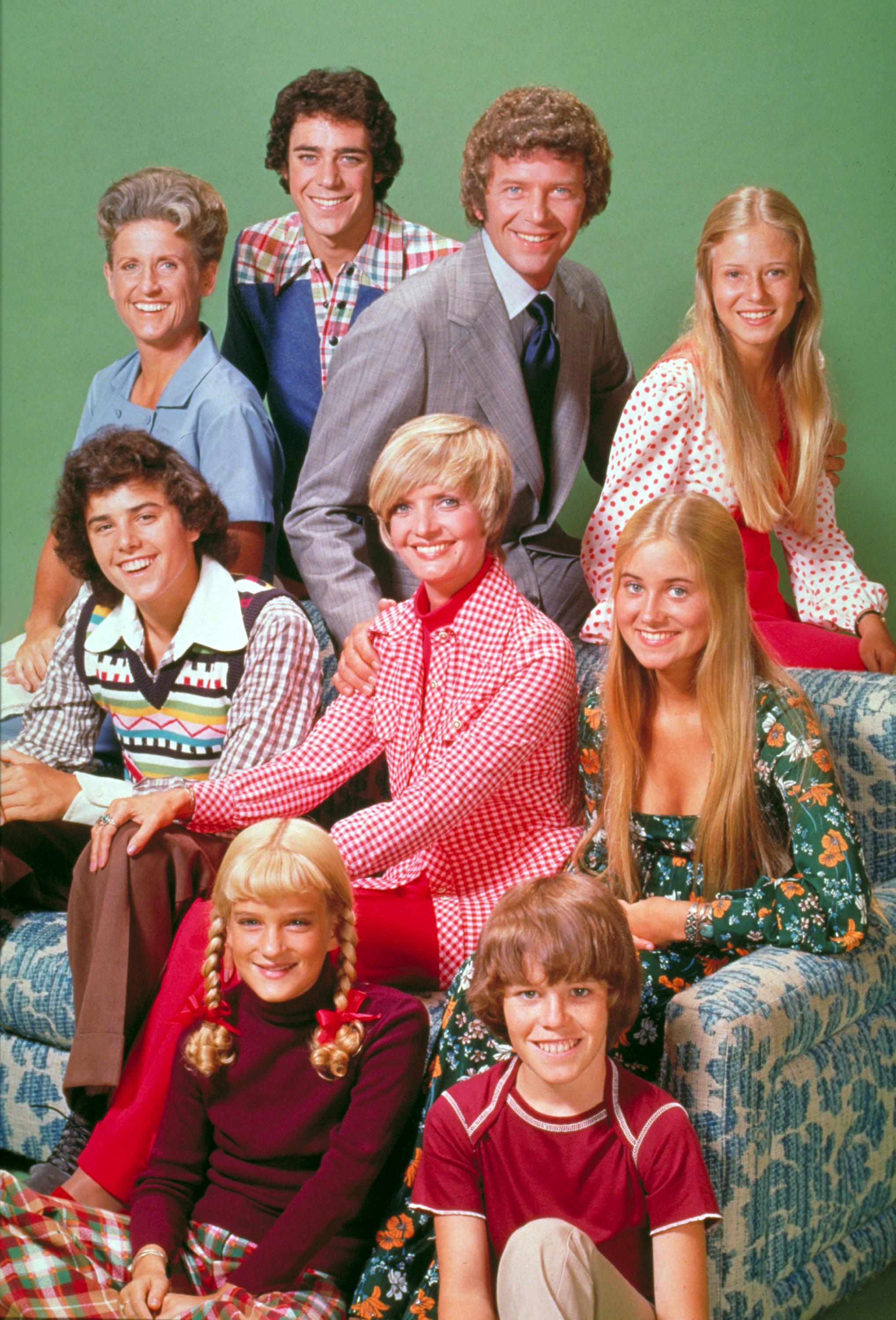 (From top row): Ann B. Davis, Barry Williams, Robert Reed, Eve Plumb; (Middle row): Christopher Knight, Florence Henderson, Maureen McCormick; (Bottom row): Susan Olsen, and Mike Lookinland on the set of "The Brady Bunch," 1973 | Source: Getty Images