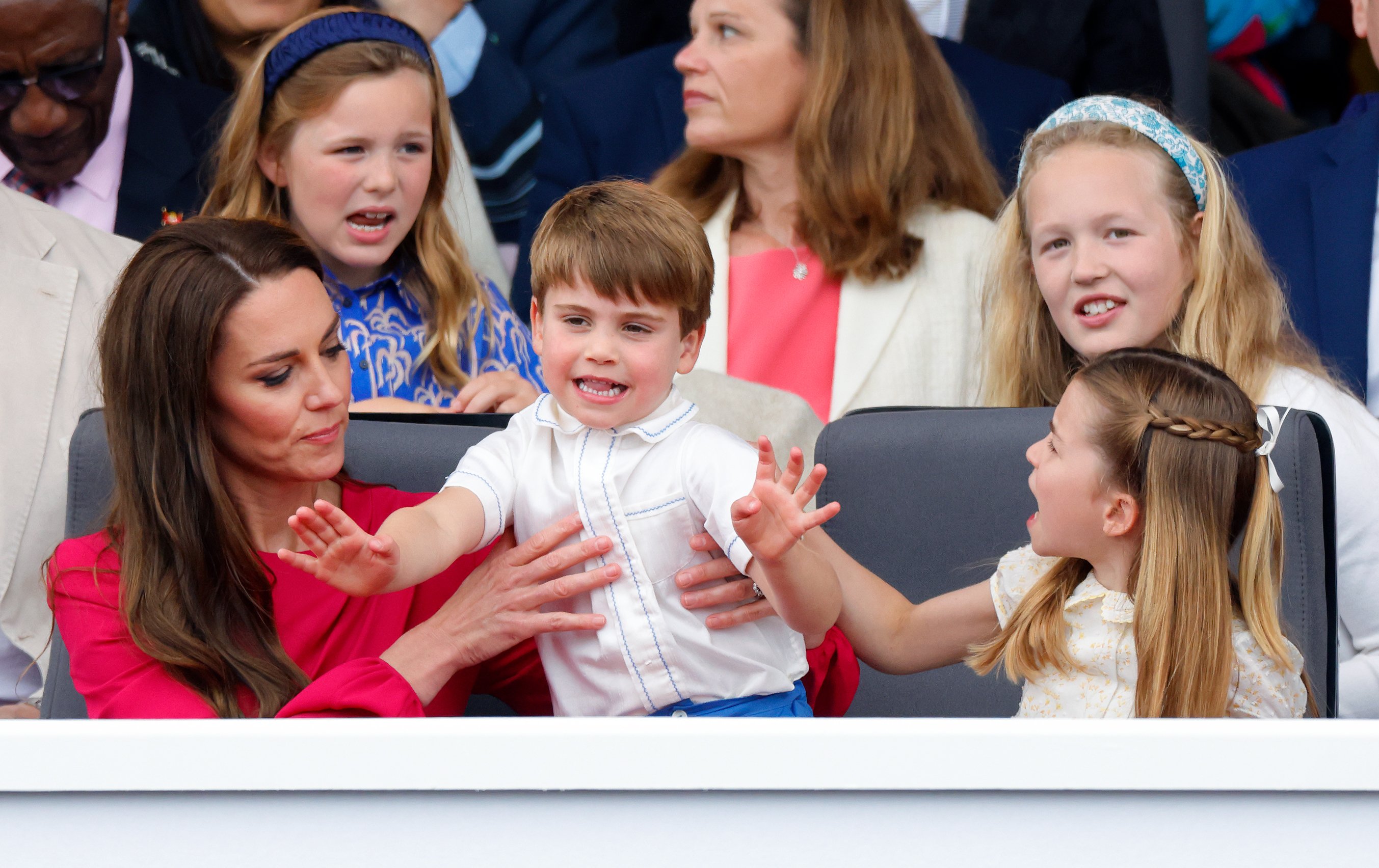 Kate Middleton with her children, Prince Louis and Princess Charlotte during the Platinum Pageant on The Mall on June 5, 2022 in London, England. / Source: Getty Images