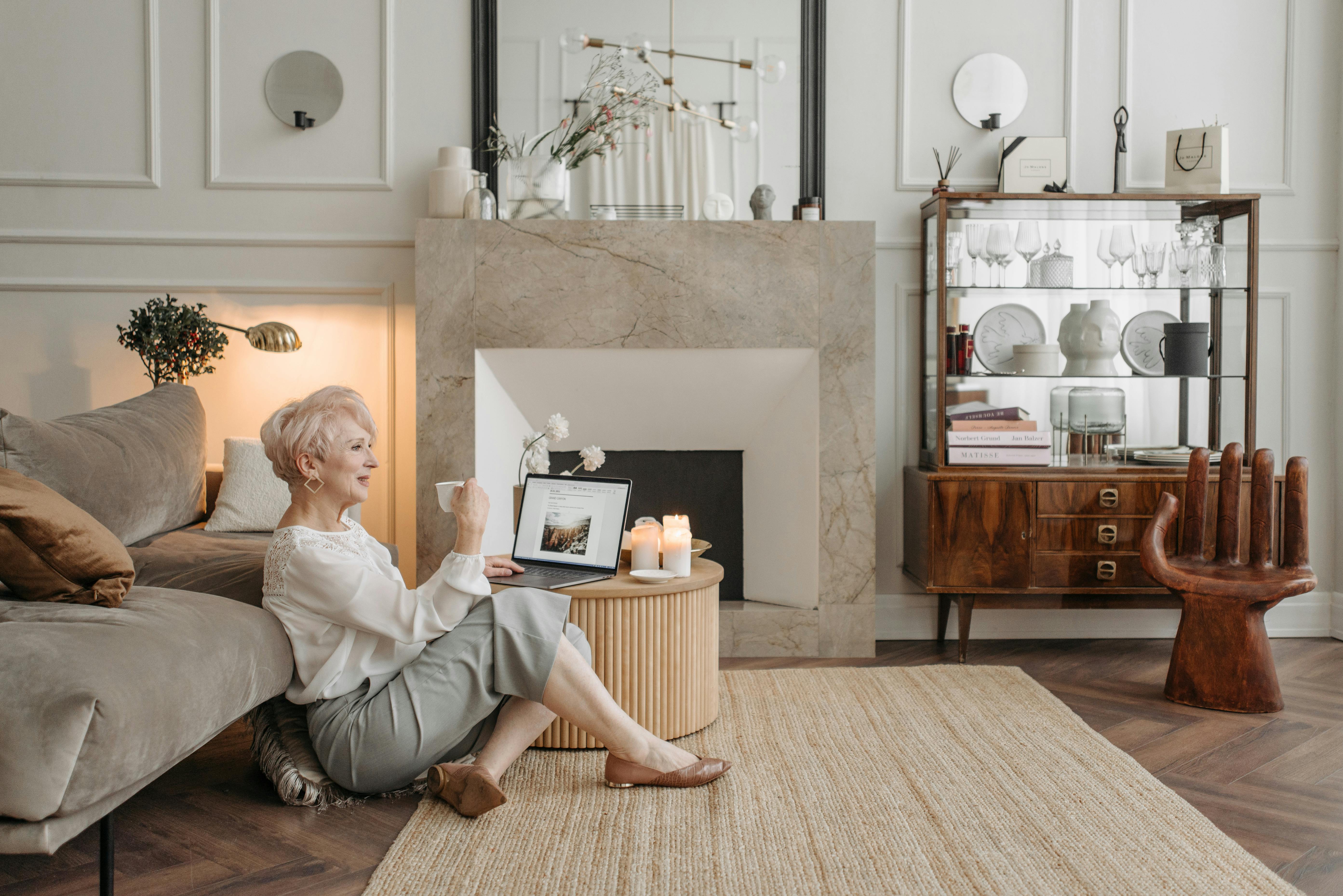 Woman sitting beside a laptop | Source: Pexels