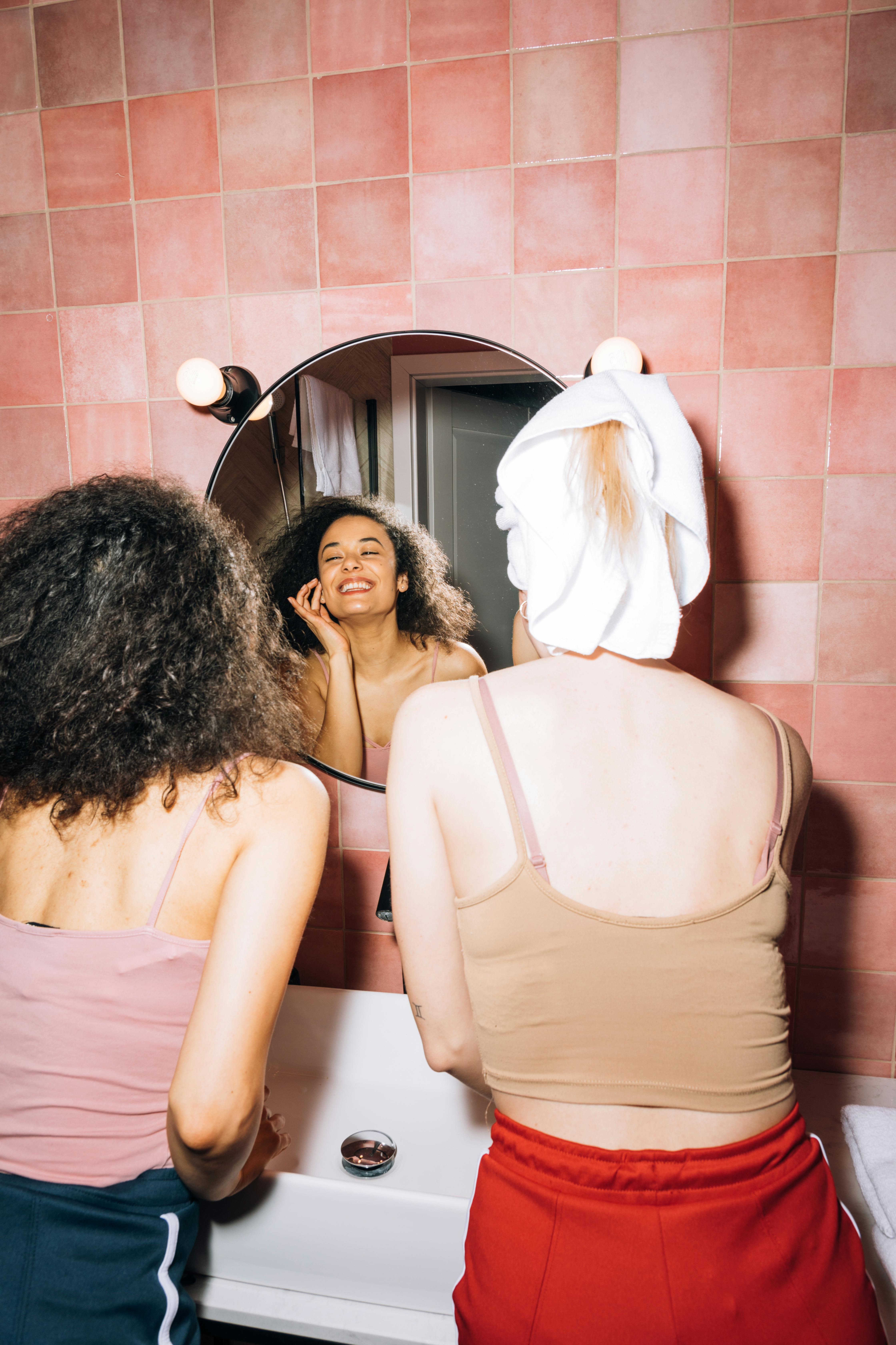 Two women laughing together | Source: Pexels