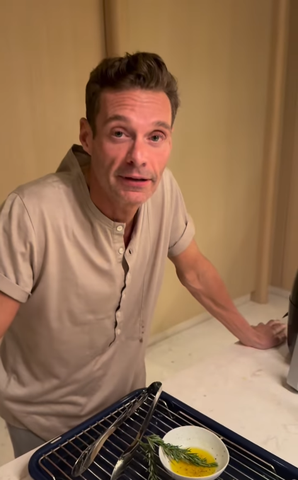 Ryan Seacrest cooking in his kitchen, from a post dated September 30, 2025 | Source: Instagram/ryanseacrest