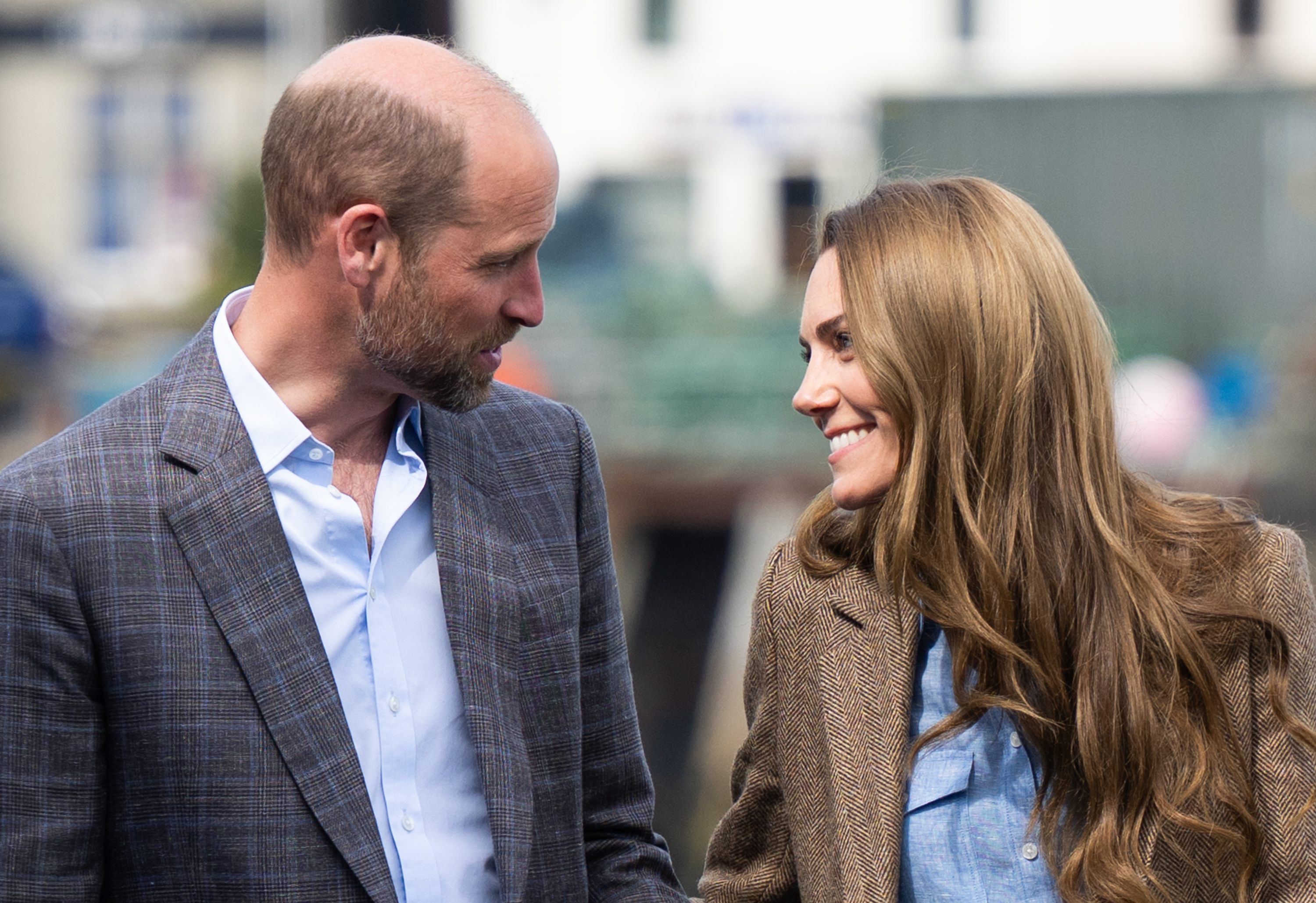 Sharing a warm, candid moment, William and Catherine smile at one another while touring Tobermory. The visit formed part of a two-day trip across the Isle of Mull and Iona, aimed at strengthening ties with rural communities and showcasing local engagement.