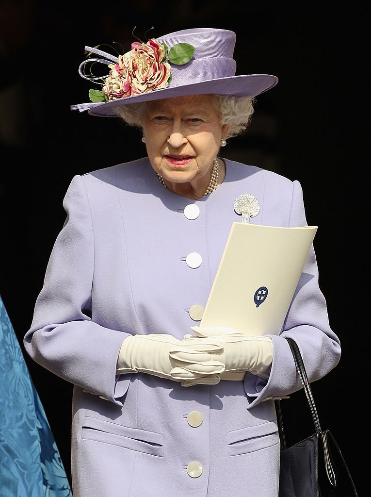 Queen Elizabeth II leaves a thanksgiving service for a thanksgiving service for the Queen Mother and Princess Margaret at St George's Chapel on March 30, 2012, in Windsor, England. | Source: Getty Images.