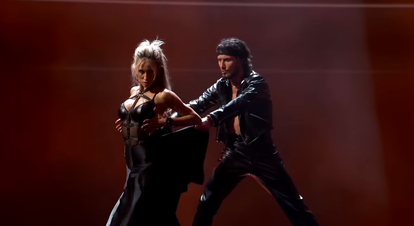 Val Chmerkovskiy tugging at Alix Earle's outfit as they begin their paso doble during Rock Hall Night on "DWTS," posted on November 5, 2025. | Source: YouTube/Dancing With The Stars
