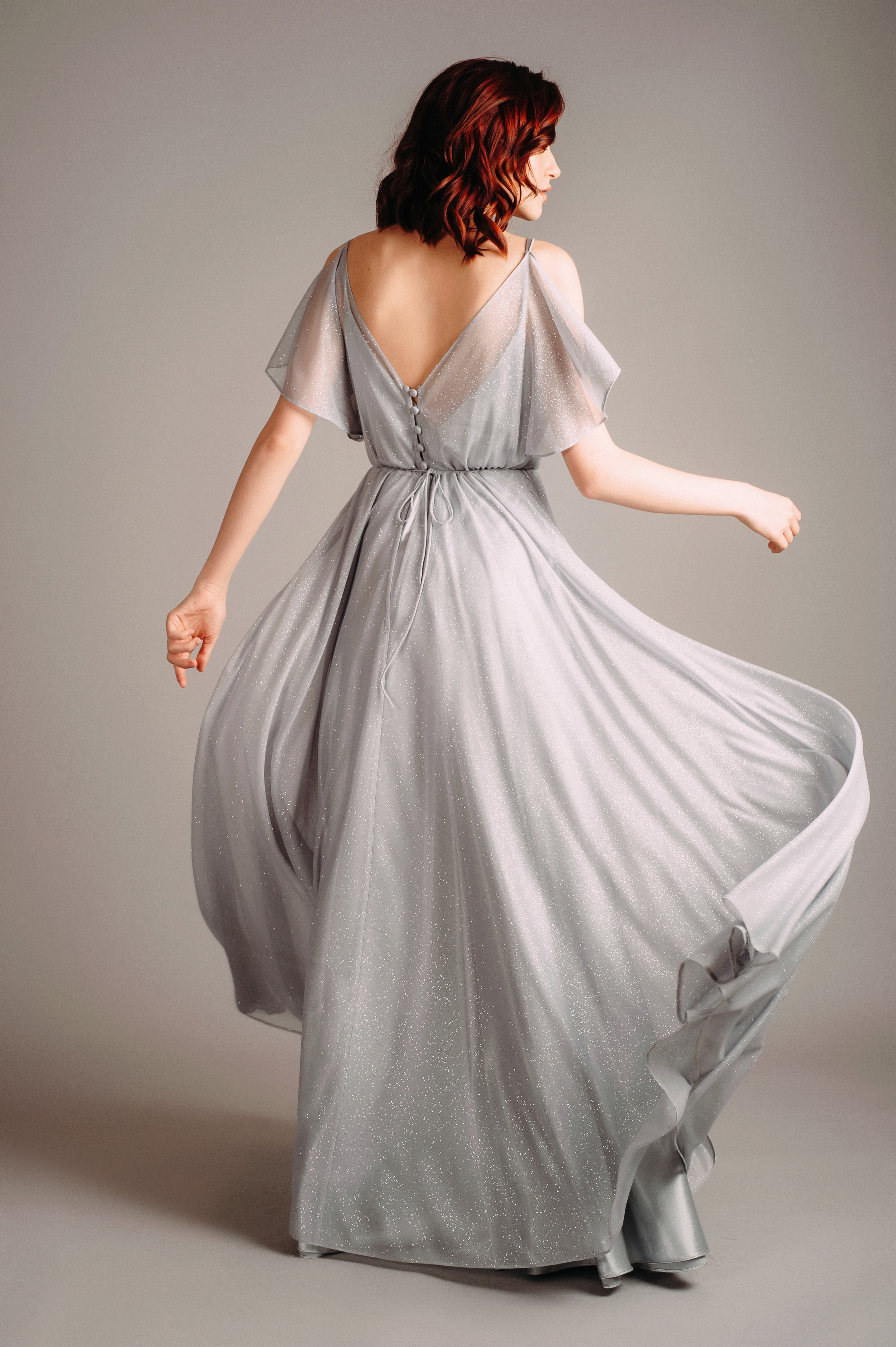 A woman wearing a bridesmaid dress | Source: Shutterstock