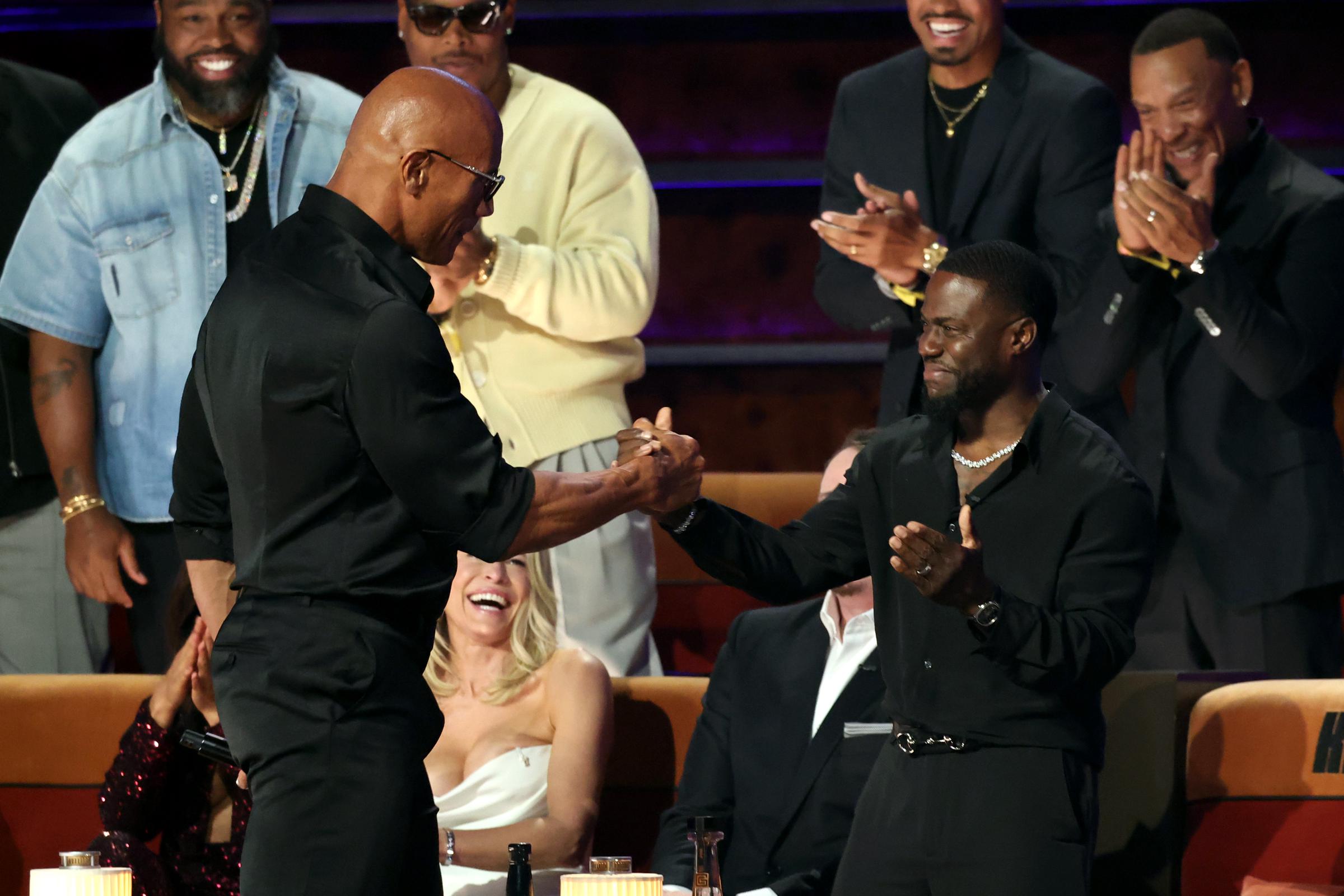 Dwayne Johnson and Kevin Hart are seen onstage during Netflix Is A Joke Festival Presents: The Roast of Kevin Hart at The Kia Forum on May 10, 2026, in Inglewood, California | Source: Getty Images